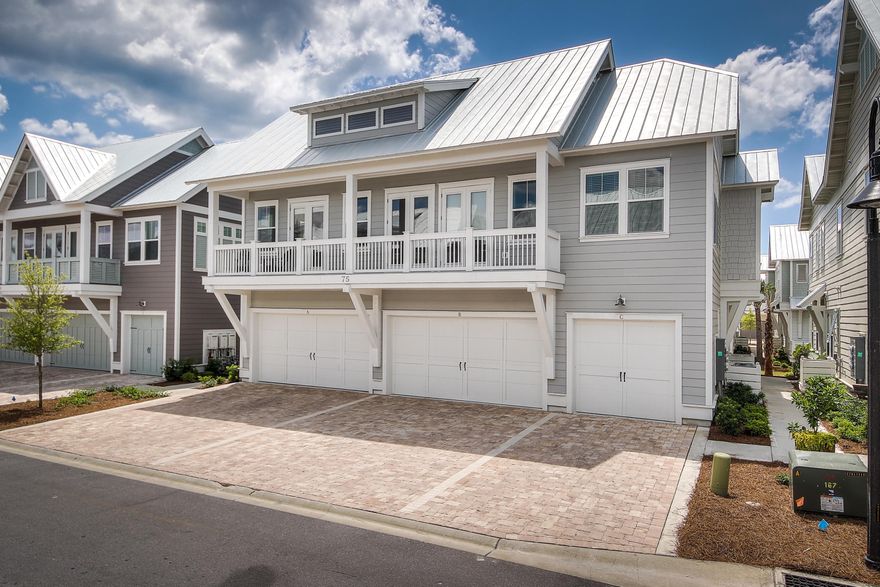 This two bedroom, two bathroom townhouse with a garage is being sold fully furnished and rental ready with $45,000 projected gross rental income. This floor plan has 10 foot ceilings, hardwood floors throughout, an open living, dining and kitchen area with french doors leading out to the outdoor living and dining space. The kitchen has stainless appliances, granite countertops, and a gas cooktop. The bedrooms are located at opposite ends of the living area so everyone has privacy but is conveniently located all on one level. The master bathroom has dual vanities, a glass shower with rain shower head and ample closet space. The guest bedroom has access to the balcony as well as a full bathroom. It offers a full-size washer and dryer...