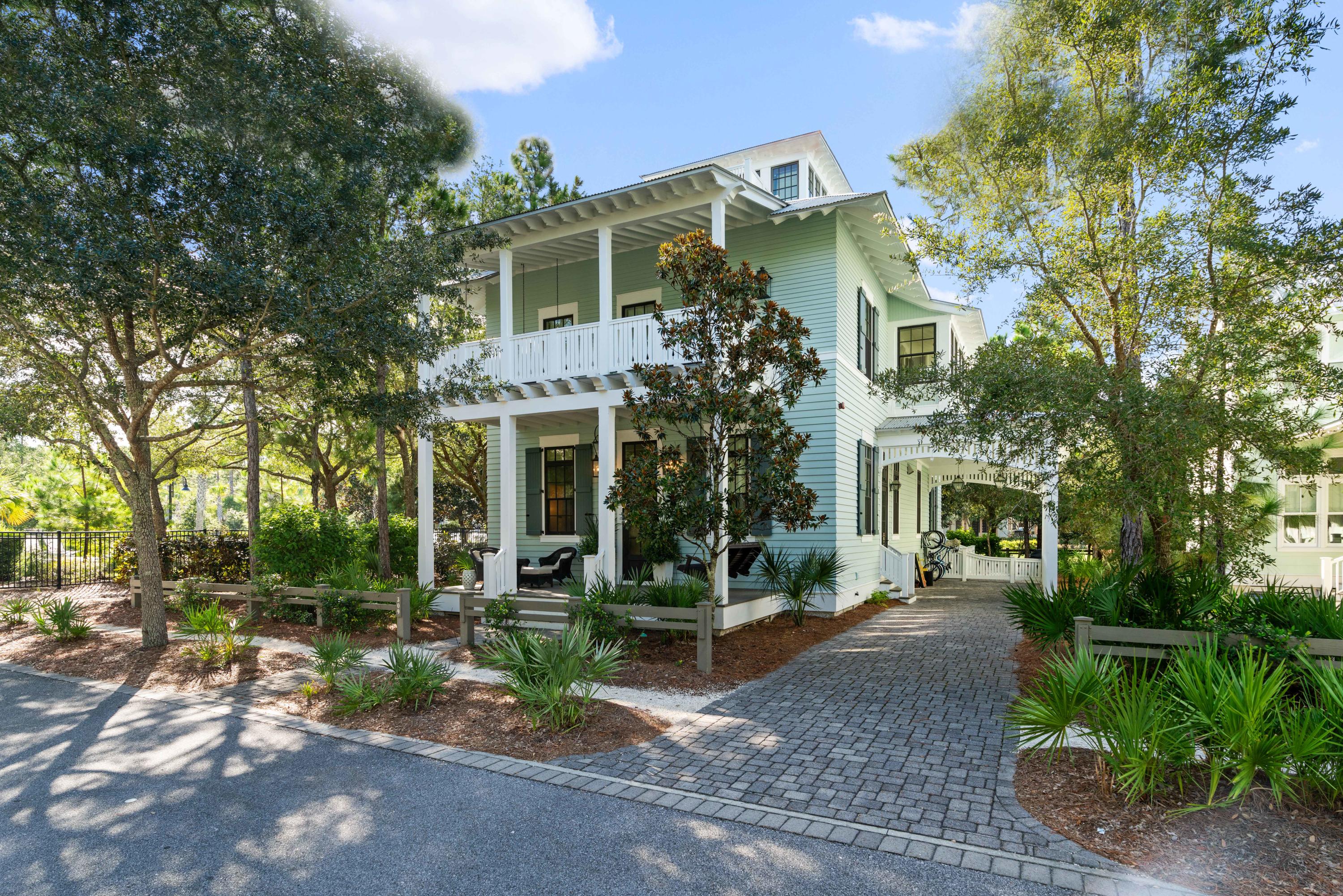 Prominently placed on Wood Fern Park in the charming community of WaterColor. This awe-inspiring home possesses all the features and elements you could dream of. Designed by Dungan & Nequette Architects and built by Chris Clark Construction, this home hits all the high notes and gives new meaning to attention to the detail! From the Main Level to the Mezzanine and Roof Level Cupula you are fortunate to overlook the recently remodeled Camp WaterColor and all that nature has to offer from Wood Fern Park. Recently updated and professionally furnished & decorated you and your family will enjoy 309 Spartina for years to come. The Main Level entry with rocking chair front porch, stunning entry way, kitchen, screen porch, dining area, living room with Tabby fireplace, and media room give way to