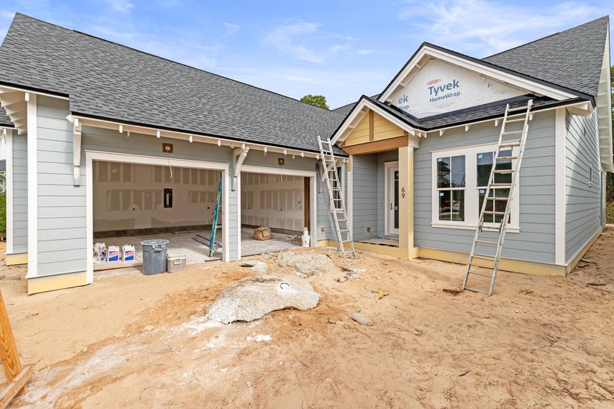 Experience the perfect blend of modern luxury and serene natural surroundings in this new construction home in Powell Landing East in the Watersound Origins community. Backing up to a peaceful community preserve, the Cyra floor plan by Arkon Group offers 3 bedrooms, 3.5 bathrooms, a study, and 2,213 square feet of thoughtfully designed living space. Designed for both comfort and style, this home boasts premium engineered wood floors throughout, upgraded tile accents, and an extended kitchen island perfect for entertaining. The chef's kitchen features high-end stainless steel appliances, stacked cabinets to the ceiling with elegant lighting, tile backsplash, and a spacious open layout that seamlessly connects to the living and dining areas. Large slider doors open the living room up to the expansive screened rear porch, where a cozy fireplace creates an inviting outdoor retreat. The primary suite includes a spa-like bathroom and a walk-in closet, while two additional guest bedrooms each have en-suite bathrooms for privacy. A gas lantern on the front porch adds timeless charm, welcoming you home in true Southern style. With 435 sq ft of covered porches, a 2-car garage, and high-end finishes throughout, this home is designed to maximize luxury and livability. 
Experience refined coastal living in one of Watersound Origins' most sought-after neighborhoods nestled alongside Lake Powell. 

Estimated completion is February 2026.

The Watersound Origins community offers an unparalleled lifestyle in South Walton, exceptional amenities, notoriously friendly and welcoming atmosphere, zero short-term rentals, and close proximity to all that 30A and Inlet Beach has to offer. Enjoy the zero-entry pool, playground, sports courts, and fitness center at the Village Commons, play a round of golf or foot golf at the Origins Golf Course, or take a walk along the many miles of walking and biking trails that wind all throughout the neighborhood! The new Watersound Town Center located at the entrance to the community offers several fantastic dining options (casual and formal), medical services, Starbucks, Publix, a Pavilion that hosts events year round, and more!