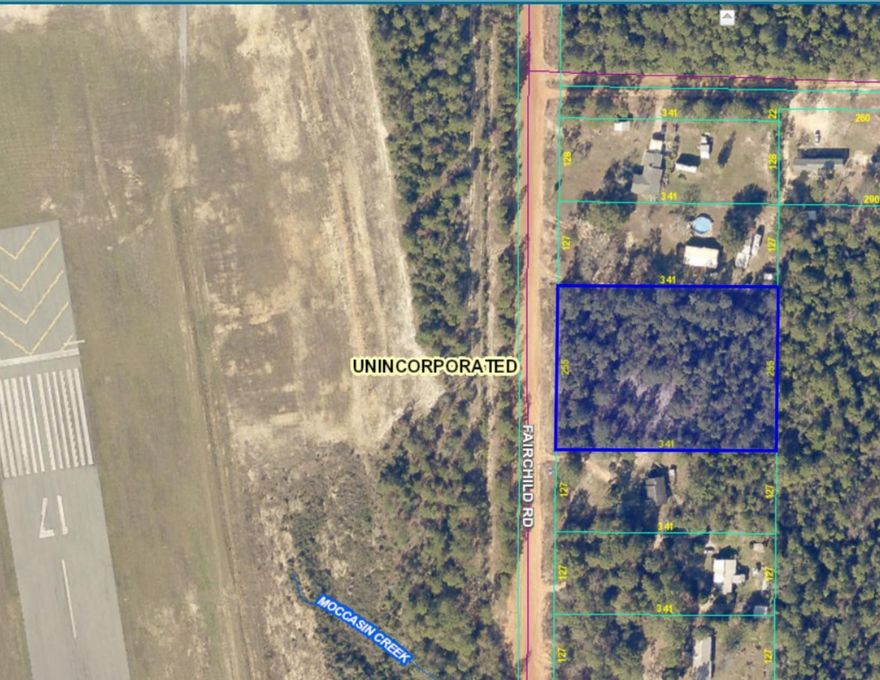 Vacant land just waiting to be developed. Coming in at just under 2 acres this land provides ample room to build. This property is across from the Bob Sikes Airport and backs to a wooded area.The land use is for single family residence, however, the parcel zoned for Airport Industrial District (see attached documents).Please note that the address 5739 Fairchild Road is not on official records at this point, however it is searchable for purpose of accessing driving directions.