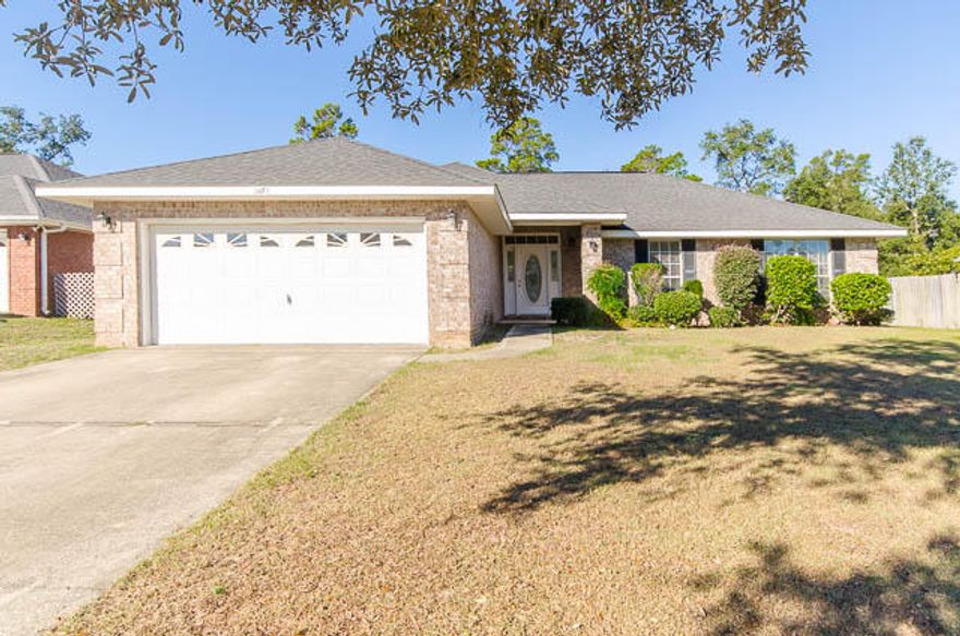 PRICED TO SELL!!! Beautiful 4 Bedroom all Brick home with 2 Full Baths, Large Great Room with Cathedral Ceilings, Spacious Kitchen with Large Breakfast Bar, formal dining room, 2 car garage. Spacious Master Bedroom with a Master Bath that has a Large Soaking Tub and a Separate Shower plus a Walk in Closet. This home is located in the sought after West Navarre School District in the Waterstone Estate Community! Perfect home for your family. Don't wait come see today!
