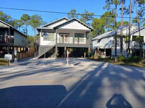 Photo of 735 Indian Woman Road, Santa Rosa Beach, FL 32459 (MLS # 988579)