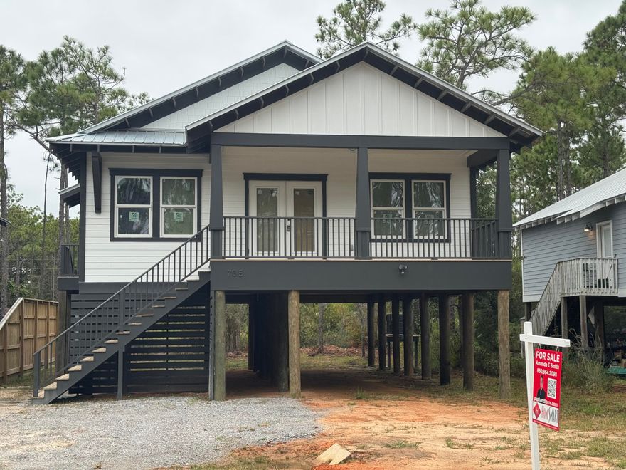 Beautiful New Home minutes from Beach, Bay, and Hogtown Bayou Park with Dock & Boat Launch!  Open Great Room & Country Kitchen featuring granite countertops, recessed lighting, custom cabinetry, and a spacious pantry with built-in shelving. Stainless Steel Frigidaire Appliances, Kitchen Island with Breakfast Bar, and Dining area.  Separate Entrance to Laundry Room (off Kitchen) with Washer & Dryer. Inviting, Light-Filled Master Suite with roomy Walk-In Closet with custom built-in shelving, large Master Bath featuring designer tile & fixture. Charming Barn Door. Enjoy fresh morning air w/coffee on the Master Balcony! Off the hall are two more generous bedrooms with roomy closets.  Easy maintenance laminate flooring! Lovely home or potential Airbnb. Take a Tour, Fall in Love, Make an Offer!