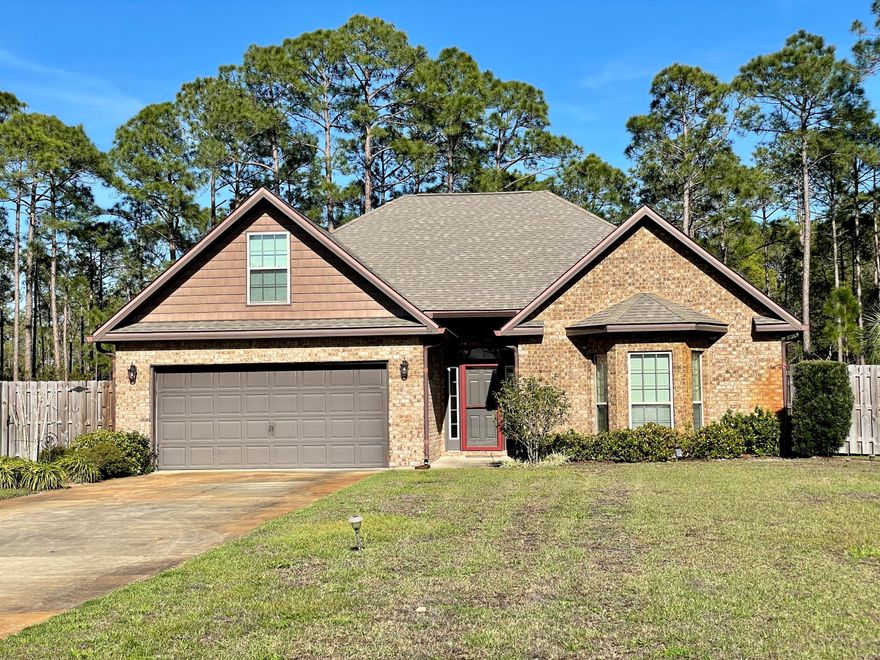 Stunning 4 bedroom/2 bathroom brick home located in desirable location of Driftwood Estates just off Mack Bayou Road.  Expansive front yard with lots of parking.  Enter into a spacious foyer with archway into the living area.  Open floor plan allows for entertaining and family gatherings.  Living area features french doors opening to a sunroom/bonus room/playroom - multi-purpose room and through to the screened patio. Kitchen features granite countertops and spacious breakfast bar along with stainless appliances. With a split bedroom floor plan you have 2 bedrooms in the front of the home and the master in the back.  Master bedroom en-suite includes double vanities, large soaking tub and separate shower.   Upstairs is a nice additional bedroom/bonus room/office/multi-purpose room.   New outside air conditioning unit 5/2022.  Large, fenced, backyard backs up to preservation area.  Owners in Driftwood Estates enjoy a fun playground and community pool all conveniently located to hospital, restaurants, shopping and the beautiful beaches of South Walton.