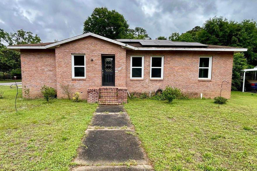 Renovated in 2021, this 1940s all-brick home has an effective date of 1990. This 4-bedroom, 3-bathroom residence features 2 open living areas, a kitchen with white shaker style cabinetry, updated countertops, stainless steel appliances, and hardwood flooring. The interior includes updated fixtures, vanities, upgraded electrical, newer HVAC and updated plumbing. Outside, you'll find a large concrete slab in the backyard, ideal for RV or boat storage. The property also includes a covered carport and a storage building, perfect for a workshop. Schedule your showing today!