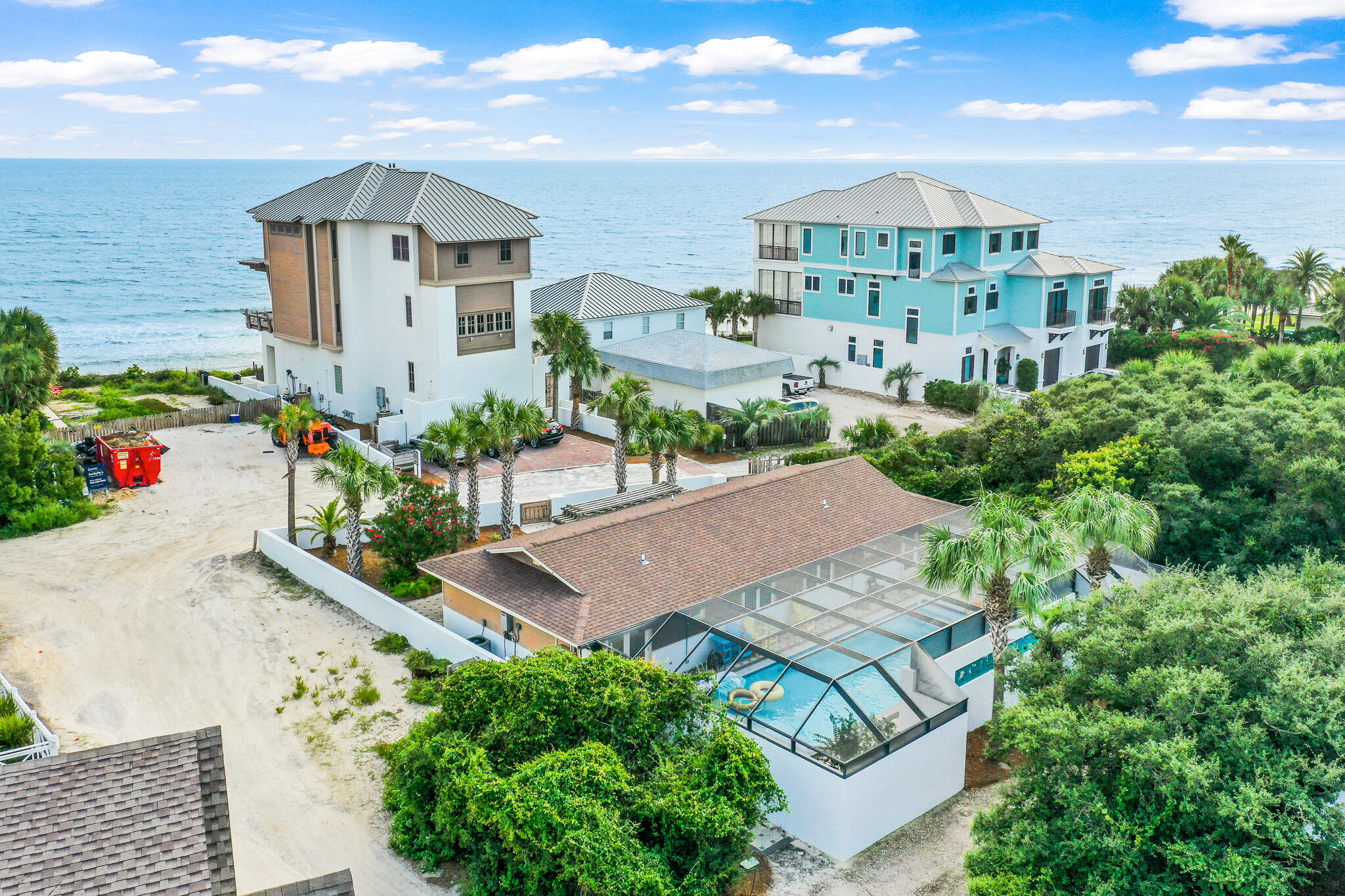 Inviting 4-bedroom home ideally located on the eastern side of Highway 30A. Steps away from the beautiful white sands of Inlet Beach and emerald waters of the Gulf of Mexico. Spacious floor plan incorporates two completely separate living areas. Both compiled with full kitchens, living room spaces, bathroom and washer/dryer units. The vaulted ceilings combined with the custom wood paneling and ambient lighting throughout give the home a warm and comfortable vibe. Both master bedrooms are overlooking the private pool area. Two additional bedrooms have custom bunk beds for added sleeping space. The ideal 30A locale offers an amazing proximity to the beach, trails, shops & restaurants in the nearby communities of Seacrest, Paradise by the Sea, and Rosemary Beach.
