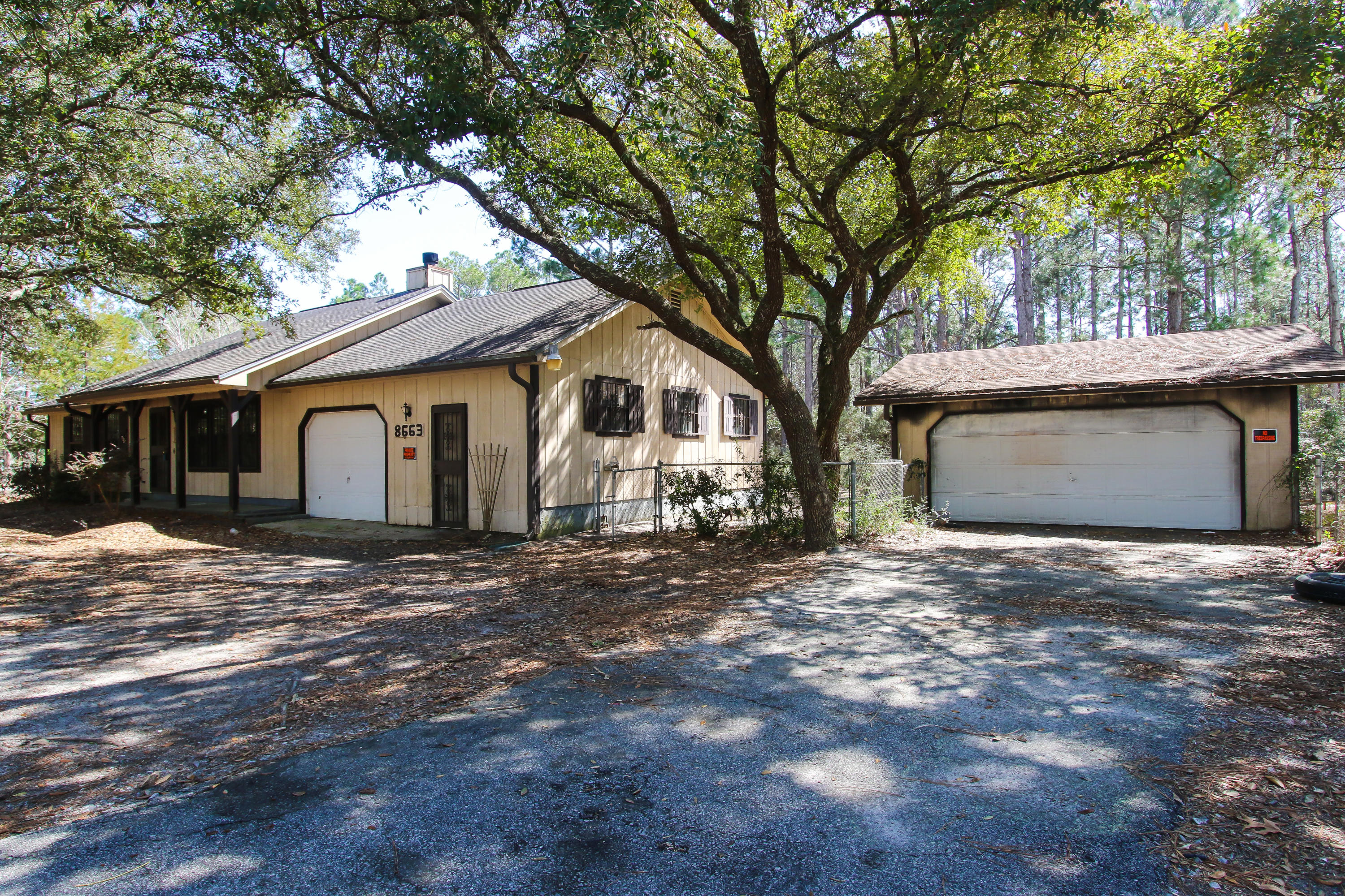 Multiple Offers received. Seller asking for Highest & Best by 10am on Thursday March 4. Amazing possibilities on this large 1.07 acre partial. Renovate existing home, tear down and build your new DREAM home or develop this land. Zoned R1. Per county...can be divided to build a few homes. Each home must have 70' road frontage and 1/4 acre lot. Looking for that serious ''Cash Buyer'' only! Corner lot surrounded by nice homes. Convenient out of the way location. But close to everything Navarre has to offer. Take a look today before your too late. Please have your offer accompanied by proof of funds. Thanks!