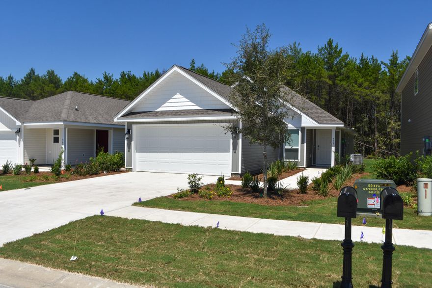 Located in the Crescent Mill neighborhood at Hammock Bay, this home this new home is available for lease Sept 1. Interior space includes three bedrooms, two bathrooms, open living area with beautiful Luxury Vinyl Plank wood grain flooring throughout. This is a well laid out floor plan. A two car garage provides security and extra storage. Open Back Patio for grilling. HOA, Garbage, Basic Cable, and lawn maintenance included.
Hammock Bay is a pedestrian friendly development. There are network of sidewalks, nature trails, and bike paths. The Hammock Bay Town Square lawn style amphitheater is designed for entertainment. There is also a $12+ million, 60 acre Sports Park featuring a multitude of ball field/park amenities nearby. Recently the developer donated land for