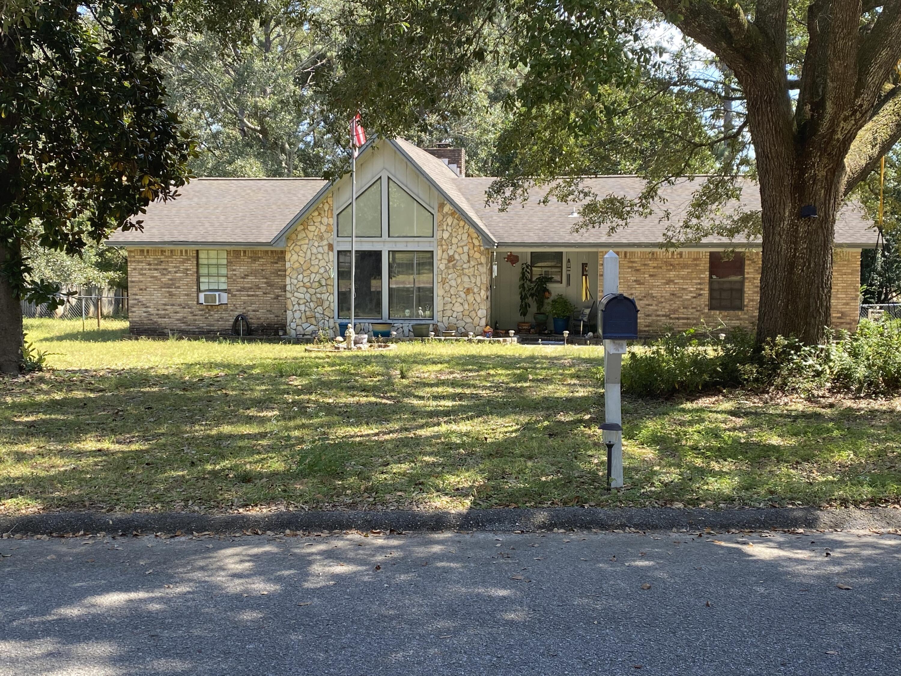 Cozy 3 bedroom, 2 bathroom brick home with 2 car garage on a quiet, low traffic street.  Spacious backyard for the family cookouts, kids playground and the pets to enjoy some outdoor fun.  NO HOA. Home is sold AS-IS.