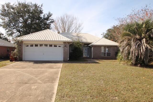 Real Estate Owned. All brick. Gas fireplace and Plant ledges in the Living Room. Tile floors in the Foyer, Kitchen,Breakfast nook and Laundry Room. Different ceilings throughout the home: Cathedral over Living Room, Kitchen & Breakfast Nook, Tray in the Dining Room and front bedroom, coffered in the back bedroom, double tray in the Master bedroom. Fully equipped Kitchen: Stove, Dishwasher, Refrigerator, and Microwave. Marble vanities in both bathrooms. Recessed lighting. Master Bedroom suite with walk-in closet, separate shower, garden tub and double vanity. Plus...18x10 Screened porch. Call to take a look today at 611 Risen Star Dr today.