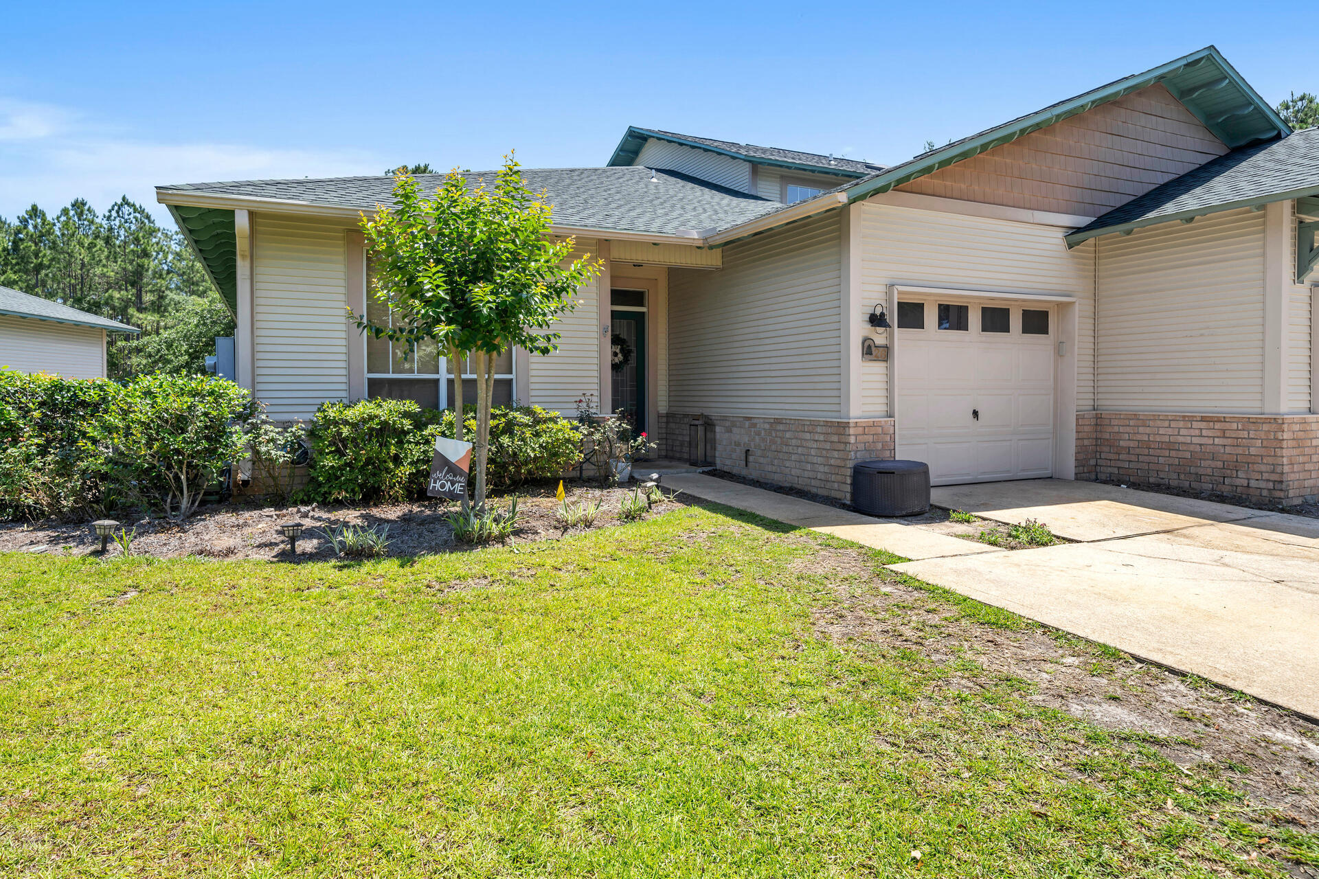 Highly sought after ESCADA Townhome w/ walking trails to the beach. 3B/2B ONE LEVEL and END UNIT. Just minutes to 30A BEACHES and Topsail Preserve State Park and only 4 miles to shopping at Grand Boulevard! This patio home features 3 bedrooms, 2 full baths, a one-car garage, fireplace and screened-in back patio. Quartz countertops in kitchen and baths, LVP flooring throughout, tile backsplash in kitchen, stainless steel appliances. Epoxy flooring in garage. Large walk-in closet in the master. View of the pond with fountain from the master bedroom. Large attic with extra storage. You'll love this community with private tennis courts, basketball court, private pool and club room. No short-term rentals. Must be 12 months or greater. Roof 2019, A/C 2016, Hot water heater-June 2022