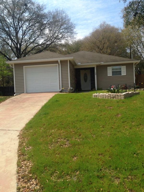 Move In Ready!!! CUTE 2 bedroom 2 bath centrally located in Crestview, 2 blocks from the Twin Hills park and 1/2 mile walking trail nearby.This contemporary home was built in 2001 with a breakfast bar and kitchen that opens into a large living room with tile throughout and an enclosed porch. Oversize garage with 64 Feet of shelving on the inside,outside storage along with a car cover/car port in the back yard. A new privacy fence with gate for extra parking for a boat or vehicle. All NEW APPLIANCES, come make 108 Fair Oaks yours!!Contact the Owner today for all detailsNon Representation