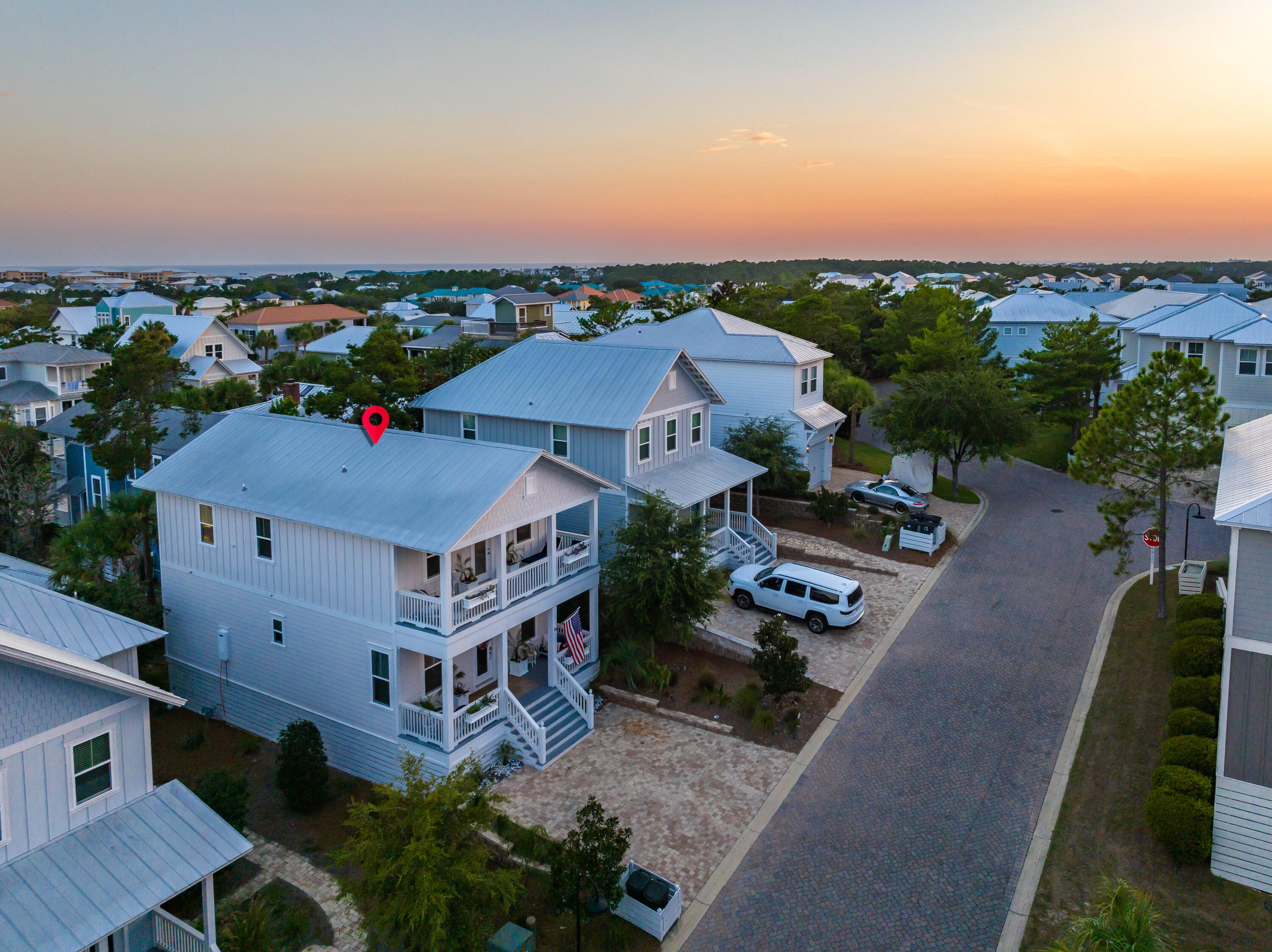 PRICE REDUCED by 100K! Upgraded home on 30A, never rented + a 6 seat Golf Cart! 2018 built, in heart of Blue Mountain Beach, this upgraded coastal luxury beach house had 1 owner, used strictly as a second home, never rented & well maintained! With tastefully appointed, high-end finishes, cabinetry, appliances and upgrades, this home also comes with a Custom 6 Passenger Golf Cart. Expansive double front porches provide ample room for you and your guests. Upgrades like 10 foot ceilings, wide-plank hardwood floors throughout, large airy open floor plan and the large, well-equipped kitchen w/ Frigidaire stainless steel appliances and lots of cabinets & storage opens to the living and dining area. A large under-home storage can hold bikes, paddleboards, surfboards etc.