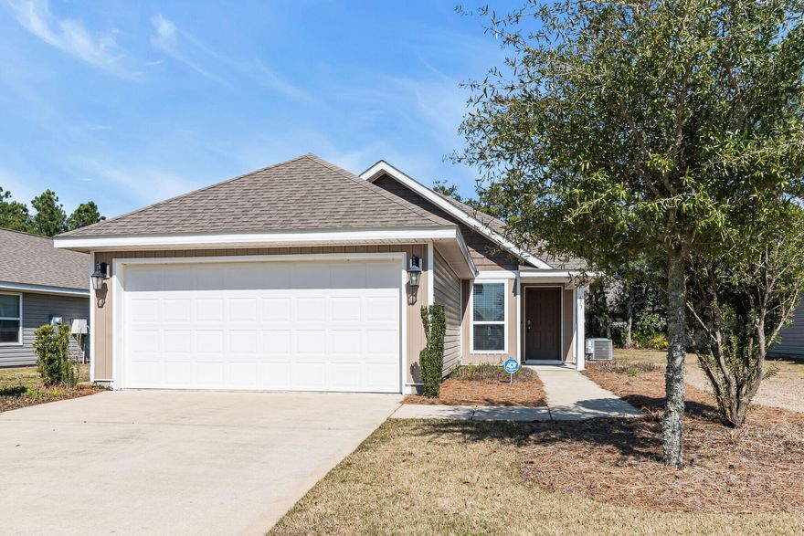 Ready for occupancy! Craftsman style 3 BDR, 2 Bath home designed for low maintenance. HOA fee includes the use of all the wonderful amenities Hammock Bay has to offer, TV cable and lawn maintenance. Easy to care for Laminate wood look flooring is throughout. - no carpet! A spacious open floor plan combines the living, kitchen and dining areas. The kitchen has all appliances including a refrigerator, a pantry and breakfast bar. A rear door opens onto a 10x14 concrete pad, perfect for an outdoor grilling area.  The master bedroom overlooks the back yard. The master bathroom has a double vanity, garden tub, separate shower, and linen closet. Master BDR also has 2 closets!  Exterior is professionally landscaped and includes an irrigation system. The Hammock Bay amenities are close by.