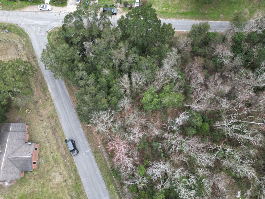***back on market at no fault to seller. Breach of contract on buyer!******.11-acre wooded corner lot zoned MDR. Public water and public sewer with ECUA. According to GIS map, no wetlands, topo is clear, and X flood zone. Tap fees have not been paid