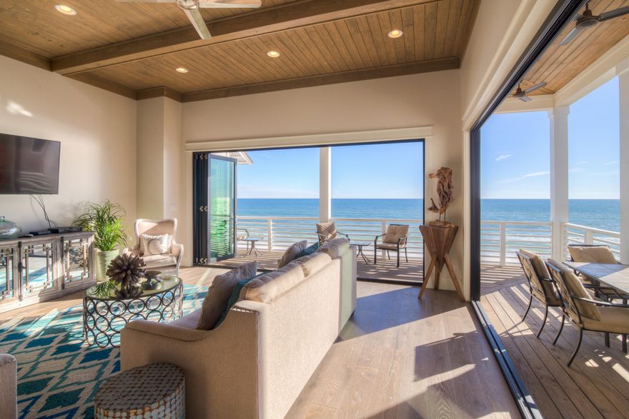 Brand new Gulf Front Construction located in Dune Allen Beach off Scenic 30A! This gulf front home features 6 bedrooms plus Bunk Room, 7.5 bathrooms, 4 master suites, 100' on the gulf, custom lanai doors, tankless water heaters. heated pool with Eco pool circulation system, custom elevator, Viking appliances, custom cabinets and countertops, and 5,700 sq. ft. This gulf front residence features many custom touches including shiplap interior, custom accent walls in master bedrooms, a ventless fireplace on the second floor, hardwood floors, ceilings with exposed beams and so much more!