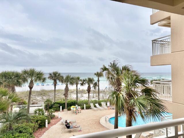 Must see this former Southern Living choice for favorite condo in Destin. Building totally renovated in 2006. Low density, gulf front and centrally located to all activities Destin has to offer. This spacious 2 bedroom , 2 bath condo with laundry room has gulf views from kitchen, living and dining areas and master bedroom. Direct gulf front 170 SF of balcony. Close to pool, bbq area and spa tub. Additionally has convenient assigned covered parking.