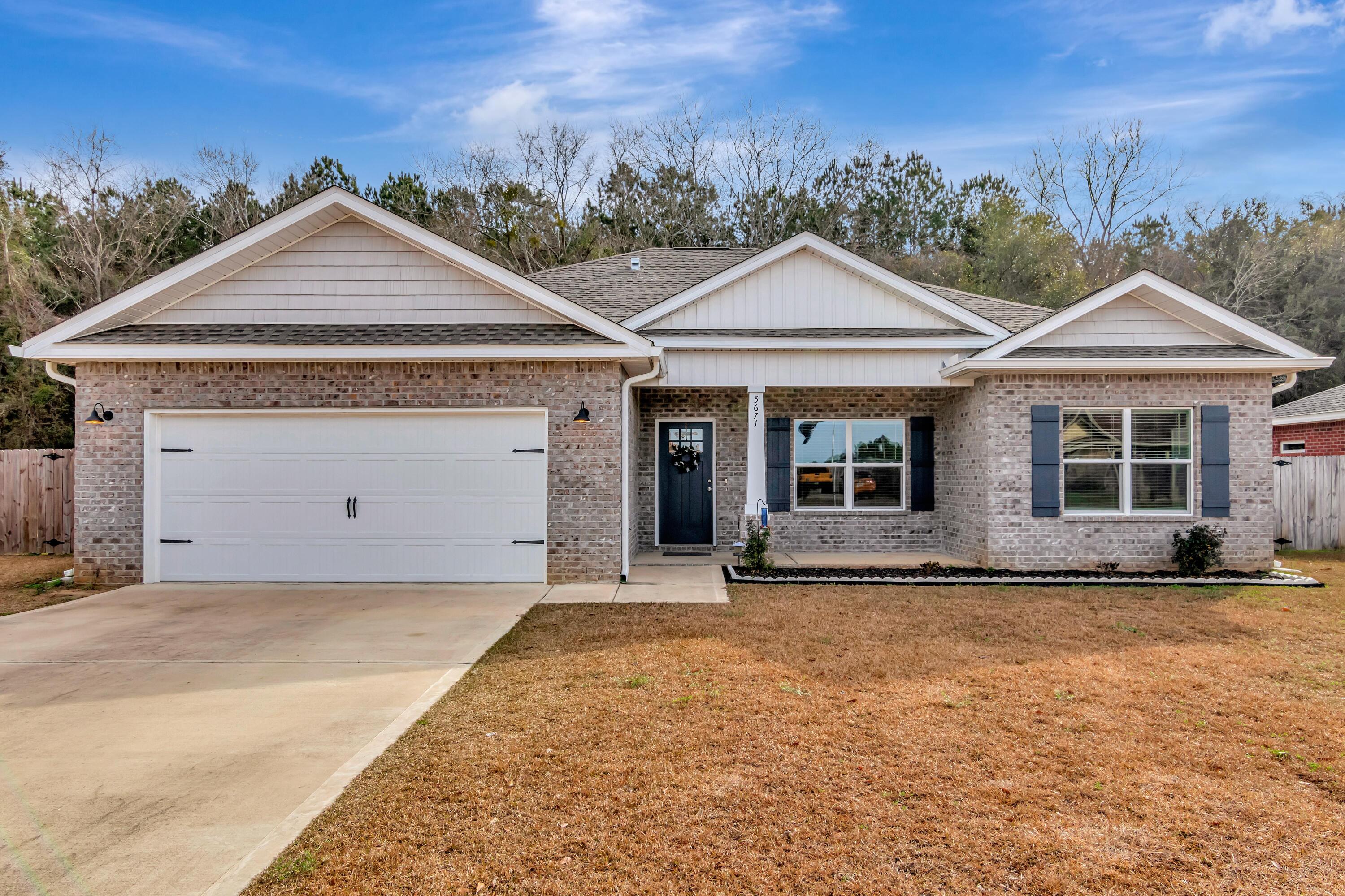 Is this your new home? Come take a look! This charming 4 bedroom, 2 bathroom craftsman style home is located in Price Farms Plantation. This 2021 Baker home is fairly new and has been well-kept. The 1,661 sq. ft. property features a 2-car garage, front and back covered porches, a fenced Backyard, large laundry room, dining area within the kitchen, sizable bedrooms, LVP in common areas and carpet in bedrooms, just to name a few. This residence embraces an open floor plan with split bedrooms, no HOA, and has had no issues throughout. Don't miss out on this opportunity!