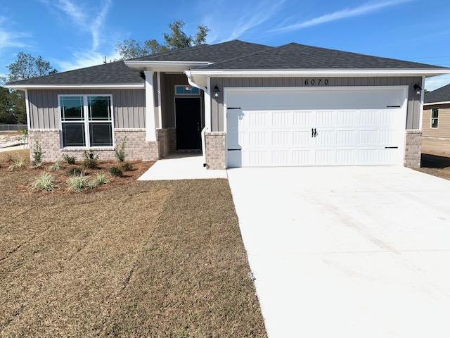 COLORS AND FEATURES WILL VARY FROM PHOTOS. Heather's Place features fully sodded yards, sidewalks, underground utilities, public water and sewer, convenient access to shopping and schools and only 8.5 miles to Navarre beach! Every home comes included with GRANITE COUNTER TOPS tops in the kitchen and bathrooms with under mount sinks, STAINLESS STEEL APPLIANCES in the kitchen, UPGRADED FLOORING in the common and wet areas and carpet in the bedrooms. Separate TILE SHOWER in the master bathroom (in most plans), covered back porches and much more. These homes are extremely energy efficient and all come included with our 1-year builder warranty. Take advantage of our $500 move in special with use of one of our preferred lender