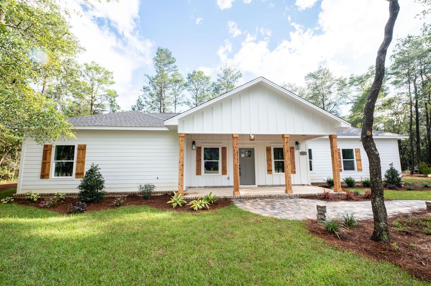 This beautiful new home is back on the market at no fault of the seller. Your chance to make this your new home. Captivating Country Living in this gorgeous craftsman style design. Inviting covered front porch with columns and tongue and groove ceiling says Welcome Home! Open floorplan is a must with today's buyer. Front door opens to the living room with coffered ceiling, ceiling fan, and the sliding door that leads to the screened back porch. What's not to say about this upgraded kitchen with white shaker cabinets, stainless steel appliances and fantasy brown granite. Walk-in pantry with wood shelving. Spacious utility room with cabinets for storage. Master bedroom with cathedral ceilings and large walk-in closet with wood shelving.