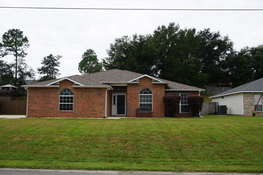 Available now!!!..South Crestview home with easy access to bases, beaches & shopping. 4/2 Floor plan with 2 living areas. Formal dining area, open concept kitchen, large bedrooms, large bathrooms, spacious back yard with privacy fence and more. Front load washer and dryer provided. Lawn care provided in rental rate.  Nice workshop for storage. No inside smoking or vaping.  Pets are allowed with homeowner approval and a $400 non-refundable pet fee.