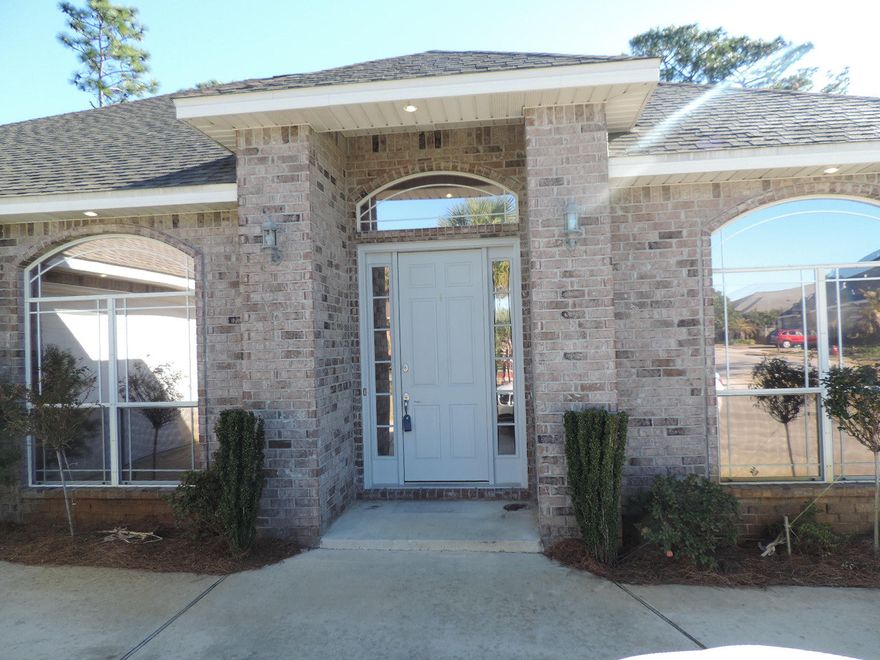 REO. Gorgeous Home in Waterfront community located on the Santa Rosa Sound in Navarre. This home features 4 bedrooms and 3 baths with 2620 Square Feet. Upgraded Features include: 11 foot ceilings, custom gas fireplace and built in entertainment area in great room, Wood Flooring in Living and Dining Areas, Crown Molding, Kitchen Island, granite counter tops and maple cabinets in the Kitchen. The Master Suite has marble countertops, a 6x10 walk in closet, a whirlpool tub and raised vanities. This spectacular community has a club house with a pool on the Santa Rosa Sound, sidewalks and street lamps to make walking through the neighborhood enjoyable at any hour! This is a Fannie Mae HomePath Property.