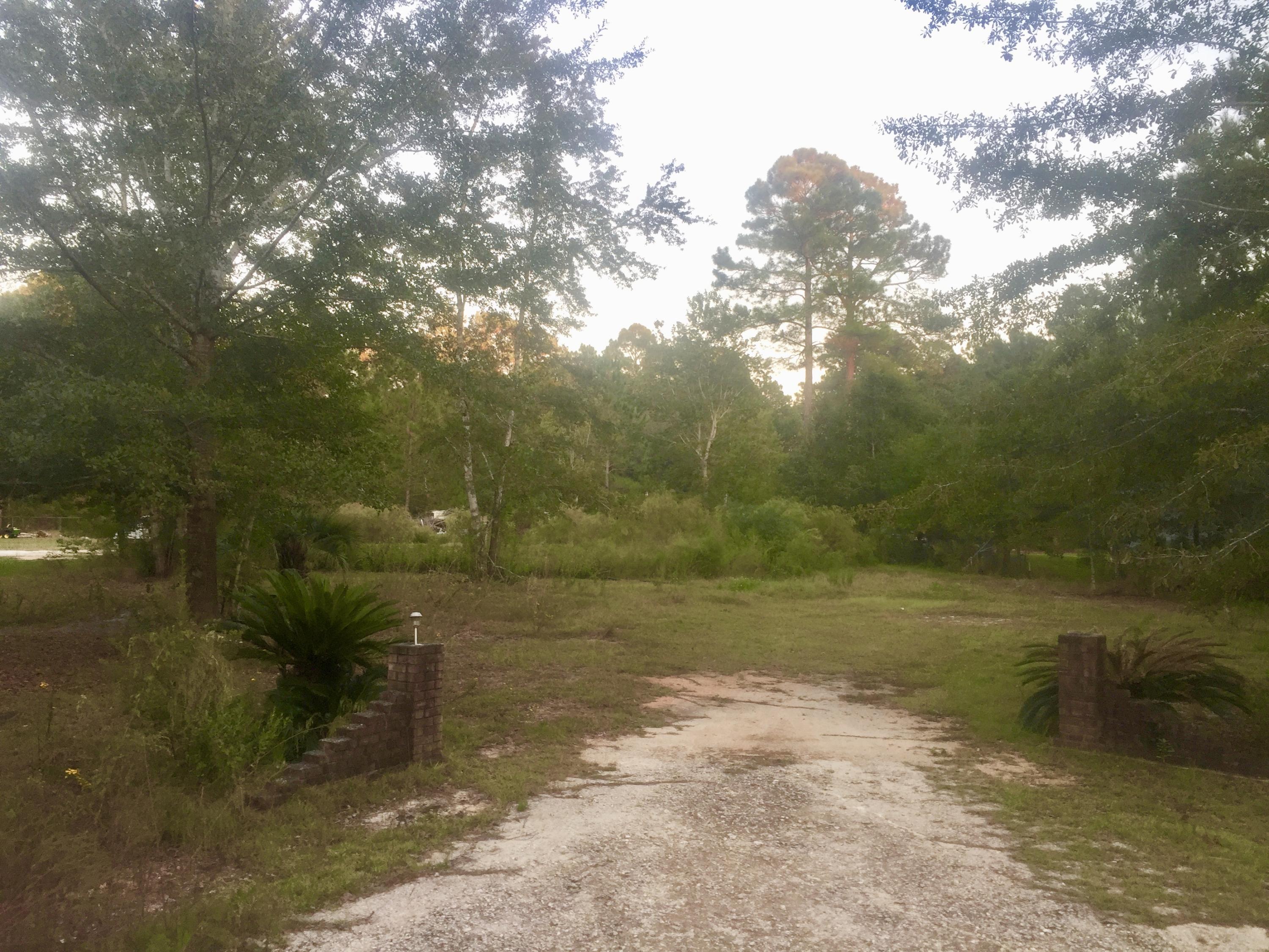 MUST SEE 0.63 acres!! NO HOA. UTILITIES in place (Septic, City Water, and Power). Come build your dream home or place a mobile home on the property instead. Shed stays. This beautiful property is located close to US Highway 331, situated just a few minutes to the Choctawhatchee Bay Field, Pilcher Park (AKA Public Boat Launch), Black Creek Lodge, Freeport Publix, and within a few miles to Freeport's Regional Sports Complex at Hammock Bay, Freeport Marina and Yacht Club, schools, restaurants, and more!You can really have the best of both worlds; quiet and seclusion yet just a short drive to all the action (beaches, shopping, dining, and entertainment) of the emerald coast. Call today.