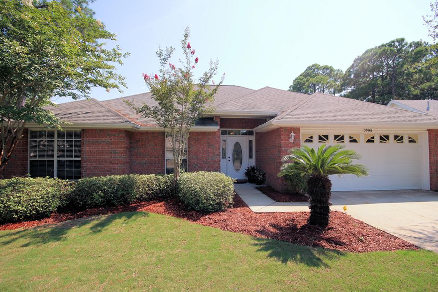 Spacious ALL BRICK 4 bedroom HOME in the Heart of Destin! The yard is small and easy to maintain and the quiet neighborhood of Hidden Pines is great for families and close to everything. The living room has vaulted ceilings, a gas fireplace and opens into the kitchen and dining area. Out the back door is a small deck to have morning coffee or BBQ in the evening. The split floor plan is perfect for a large family and one level living will accommodate all family members. Come see this lovely home!!