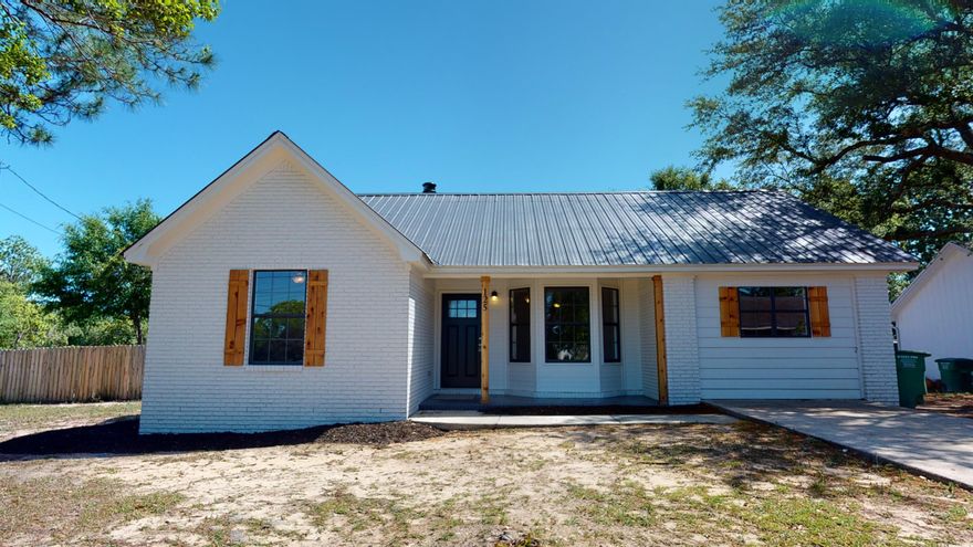 **Click on link for 3D Virtual Walk Thru** Come take a look at this newly renovated 4 bedroom home with an In Ground Pool (new liner,) SOUTH of I-10! Open floor plan with a custom renovated kitchen that has been totally updated with beautiful new shaker style cabinets, granite counter tops, white tile back splash, and stainless steel appliances. Living room features a custom wood mantle over painted stone fireplace. Vinyl plank ''wood look'' flooring in living areas and bathrooms and newly carpeted bedrooms. Both bathrooms have been completely remodeled and updated with new custom vanities, hardware, white marble counter tops and refinished showers. New trim work including painted ship lap wood on ceiling in large Florida room and on walls in certain areas, all new light/fan fixtures,