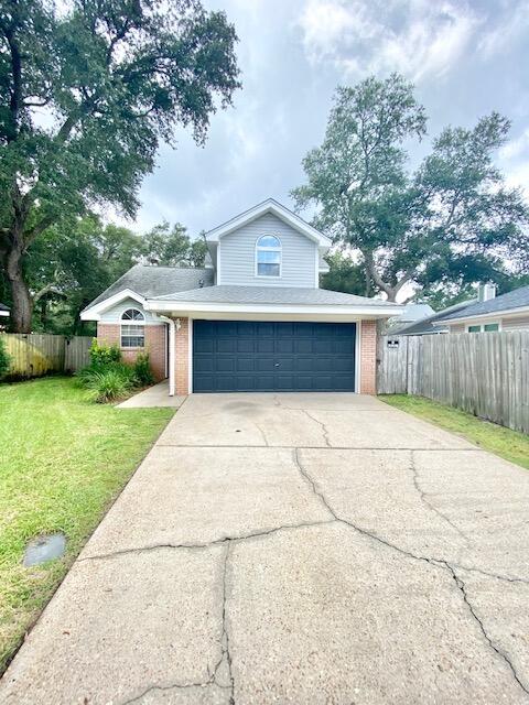 Avail: 5/1. Security deposit = $1995. Yard service included in the rent! 1 SMALL DOG ALLOWED UPON OWNERS APPROVAL & W/ A NON-REFUNDABLE PET FEE. Nice home in Shalimar on a dead end street! Neutral interior paint throughout! Carpet on the stairs & upstairs bedrooms. LVT wood looking flooring throughout the rest. Living room has a fireplace (decorative only), cathedral ceilings & recessed lighting. Kitchen w/ a breakfast bar & all appliances in place. Open living/dining/kitchen combo. Inside utility room w/ washer & dryer included (bonus item/not warranted). 1/2 bathroom downstairs for guests. Split bedroom plan for privacy w/ the master suite downstairs. All bedrooms have ceiling fans & walk-in closets! Home also features an oversized 2 car garage w/ auto opener, open back patio & privacy fenced backyard w/ a lawn pump & sprinkler system on a timer. Only 2 vehicles allowed due to limited parking. SORRY, NO SMOKING OR VAPING ALLOWED INSIDE OR OUTSIDE/ANYWHERE ON PROPERTY BY TENANTS OR GUESTS PLUS TENANTS NEED TO VIEW THE PROPERTY IN PERSON BEFORE APPLYING.