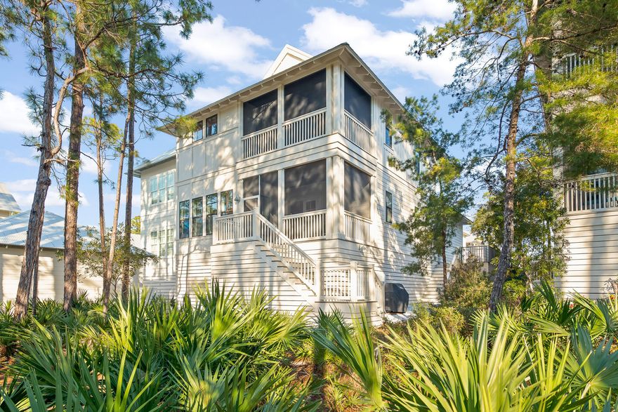 In the gated neighborhood of Lakeside At Blue Mountain Beach, you'll find this stylish, stunning custom built home, which has never been rented, is well maintained & boasts spectacular views of the preservation area around Redfish Lake. Complete with 4 spacious bedrooms plus an office, 3 double vanity bathrooms & a powder room, this home is perfect for families & investors alike. Enjoy details such as large walk-in closets, a master suite on the 1st & 2nd floor, custom trim work & specialty walnut wood floors throughout. Within the home, you'll find a bright, open kitchen with an island perfect for entertaining. Relax on the enlarged front porch or one of two rear screened porches, take a swim in the neighborhood pool or stroll down a half mile to the Gulf of Mexico. Designed by