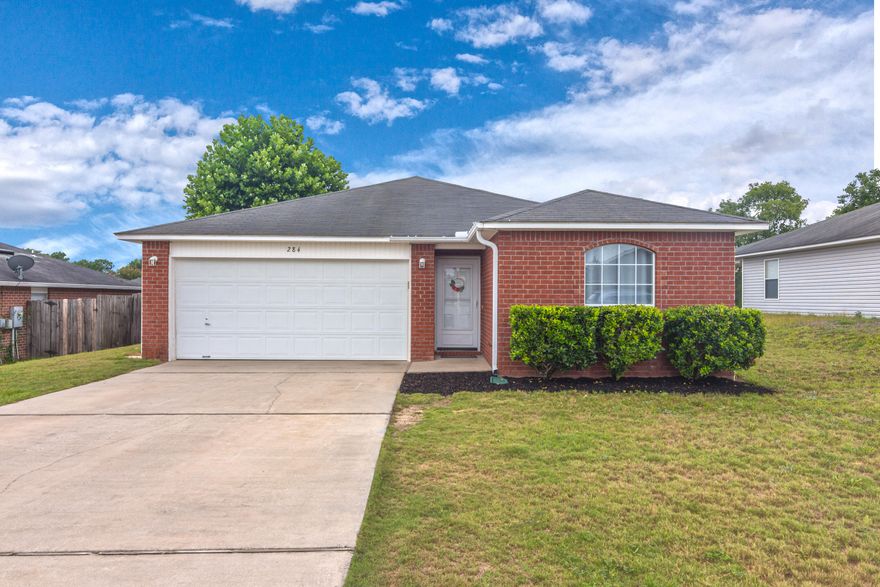 Beautiful home in South Crestview! Bedrooms have brand new carpet and main areas are all stained concrete-easily clean up for kids or pets. Great condition. Granite in kitchen and stainless appliances. Large living room. Split floorplan and good size laundry area. Fenced backyard with screened in porch. Fire pit for entertaining.