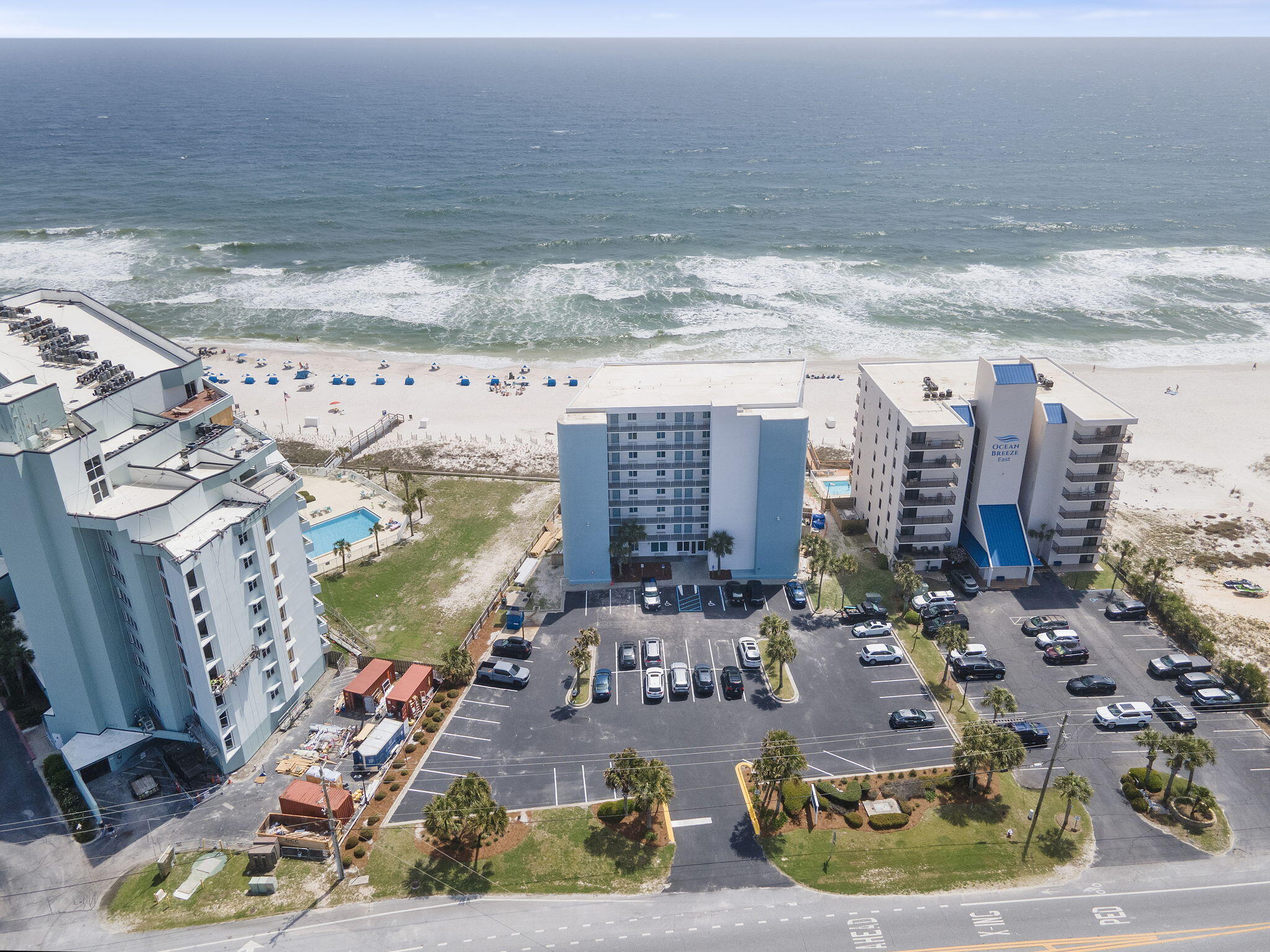 Located along the shores of beautiful Perdido Key, this exclusive beachfront 1-bedroom, 1-bath residence at Perdido Skye offers breathtaking views of the emerald waters of the Gulf, along with the privacy & tranquility expected from a quaint coastal retreat. Positioned directly across the street from Villagio & just a short distance from the secluded beaches of the National Seashore, this location is ideal for those seeking both convenience & serenity. Inside, the condo is nothing short of impressive, showcasing meticulous attention to detail in every update. The open floor plan creates a seamless flow between the spacious living & dining areas, leading to a private balcony where sunset dinners can be enjoyed at the high-top table while overlooking the beach. The bedroom features a comfo