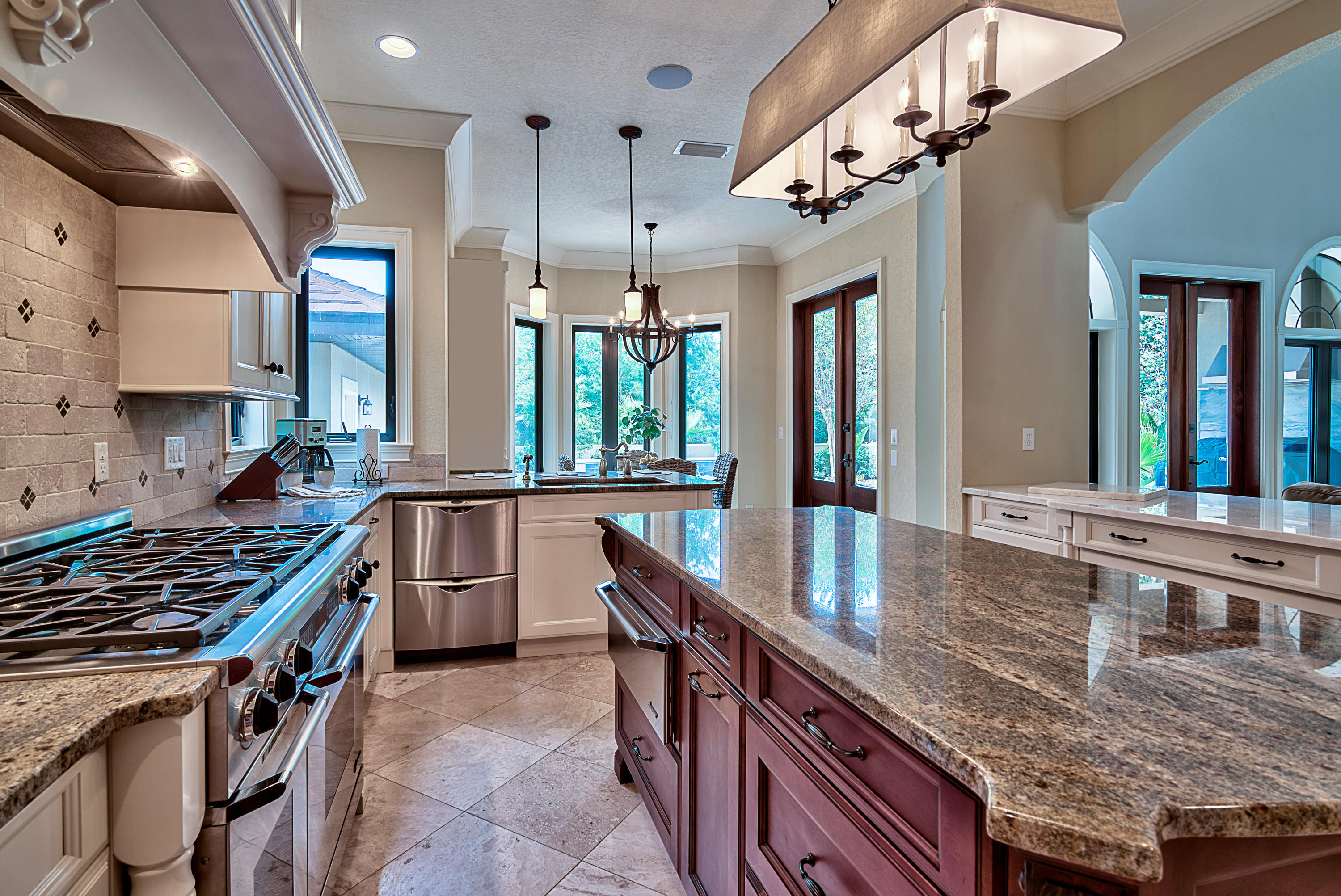 The one you've been waiting for! Combining simplicity with warmth and character, this Coastal estate home offers a resort lifestyle and endless activities within a quick golf cart ride. An ideal floor plan with three living areas including the bonus loft upstairs, formal dining room, and informal dining area with breakfast bar. The Family Room features 20' ceilings, a beautiful stone fireplace surrounded by custom cabinetry, and a wall of windows with French Doors leading to the outdoor living. The first floor Master Suite is the ideal place to unwind with an extended sitting area and luxurious master bath with his and hers walk-in closets. Situated on a private preserve, the outdoor living area and pool provide the perfect atmosphere for refined entertaining and secluded relaxation.