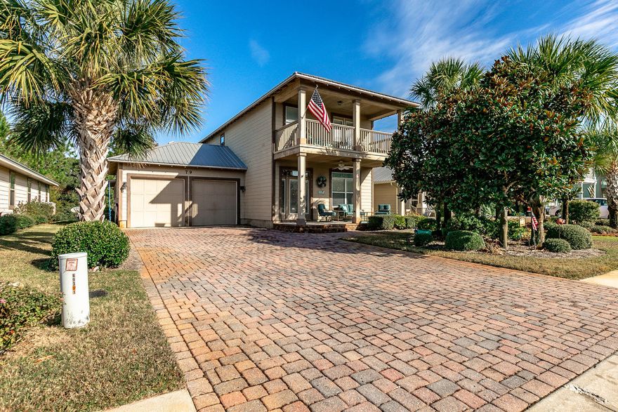 This four bedroom 3 full bath home home is one of a kind. Pristine condition ! Located in the desirable Eagle Bay subdivision. A five minute walk to the Bay and 1 1/2 miles from the beach access on 30A.. This open floor plan has large living room and kitchen area. Granite counter tops and plenty of cabinets and a kitchen island that seats many. This home offers 2 master bedroom suites. One on main floor and one on 2nd. Master bedroom balcony on 2nd floor is perfect for those summer nights. Additional sunroom off the living area adding 300 square ft.. This lot backs up to a open lot as to add to your privacy. This home is a must see.