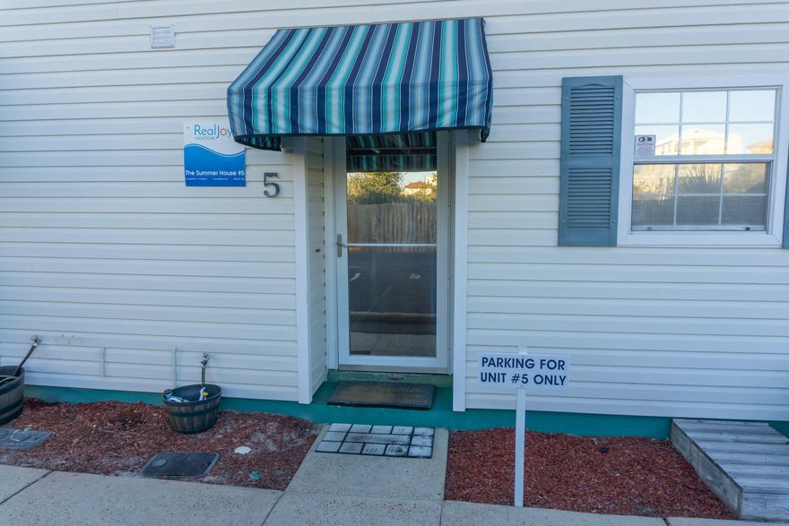 This is a great price for this close to the beach. This townhome has a new exterior doors. New A/C unit, new hot water heater. There is new Granite in Kitchen. The bathrooms have new vanities and high efficiency dual flush toilets.     Ready for sunsets at the beach? This is the home for you! It is on rental program. Directly across the street from the beautiful emerald green waters and white sand beaches in Miramar Beach. GREAT vacation rental, second home or primary residence.  this home is being sold 'fully' furnished with exception of picture above Sofa! Linens and towels do not convey as they are property of the rental company. A MUST SEE!