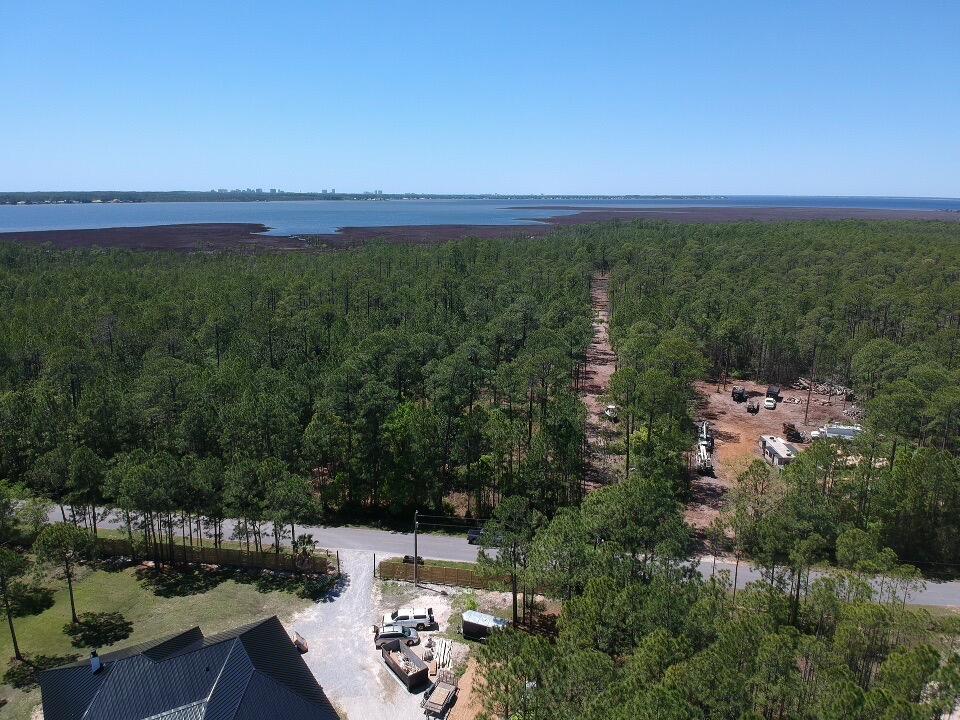 Nice 5 acre parcel on North Church St, located just off Highway 393 in Santa Rosa Beach. Lots of privacy to build a dream home, trail ride, or simply leave alone to enjoy nature. 1 mile to Charles Cessna Boat Ramp, with children's park, boat launch, fishing dock, picnic tables and gazebos. The lot is 10 minutes from the Beaches of 30A, Sacred Heart, and Grand Boulevard. The survey and environmental study are available. Zoned as Conservation Residential, which is 1 unit per 2.5 acres. 2+ acres of upland. The remaining acreage can be used for agriculture, horses, etc.