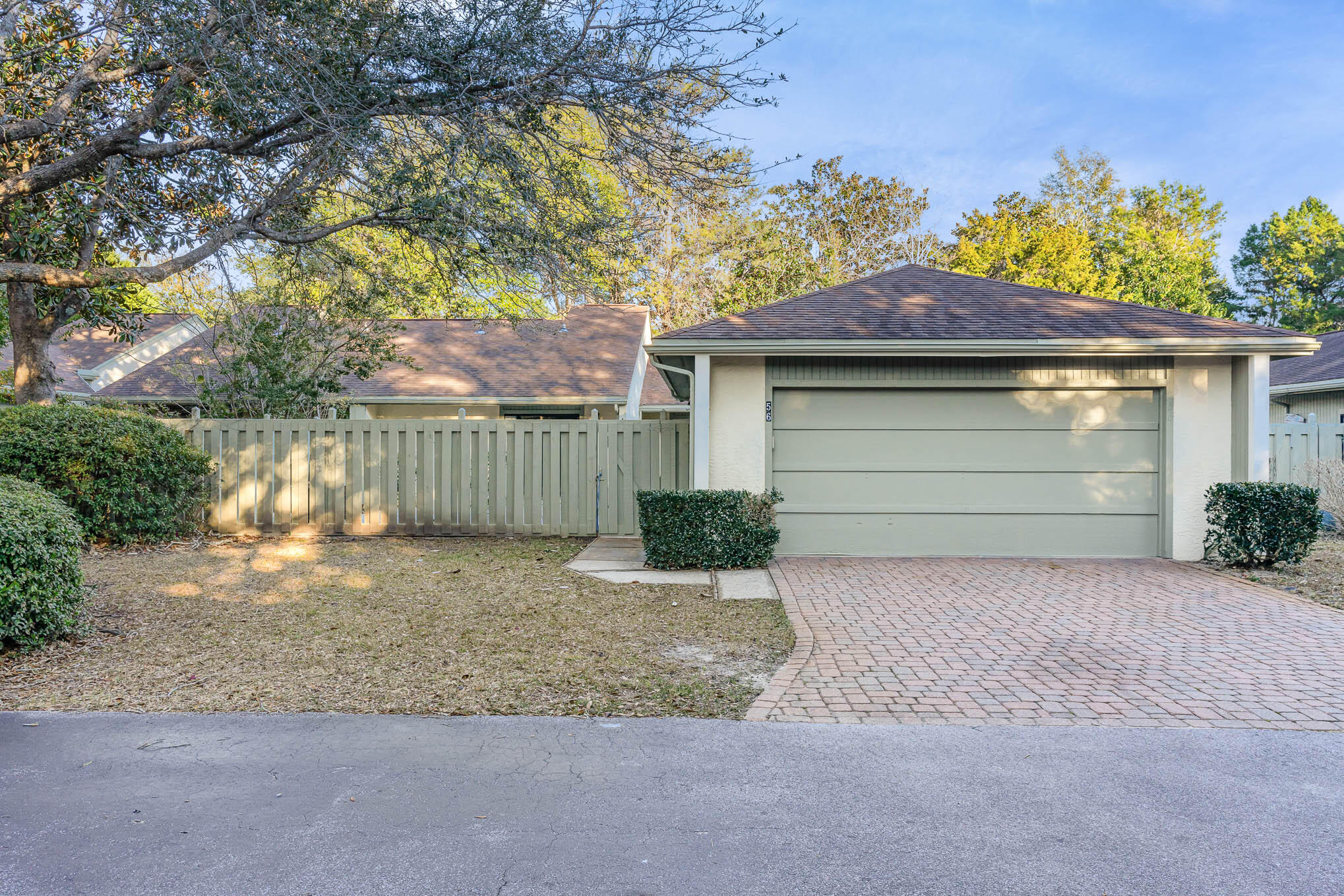 Charming 2 bed, 2 bath patio home in the heart of Bluewater Bay. You are welcomed by a very appealing stone paver driveway. Enter through a spacious private courtyard (perfect for entertaining.) This property has features unlike any other similar units. Welcoming foyer with an abundance of light, vaulted ceilings, 2 sizable living areas, large kitchen, dining room, office. Both bedrooms have large walk-in closets, with a private patio off the primary suite.The oversized 2 car garage with workspace, cabinetry, shelving and storage closets. Garage recently upgraded with additional lighting and ceiling fan. The Bluewater Bay community offers access to tennis courts, walking paths, community pool, short distance to LJ Schooners restaurant and oyster bar inside/outside dining, live music and gorgeous sunsets and much more.