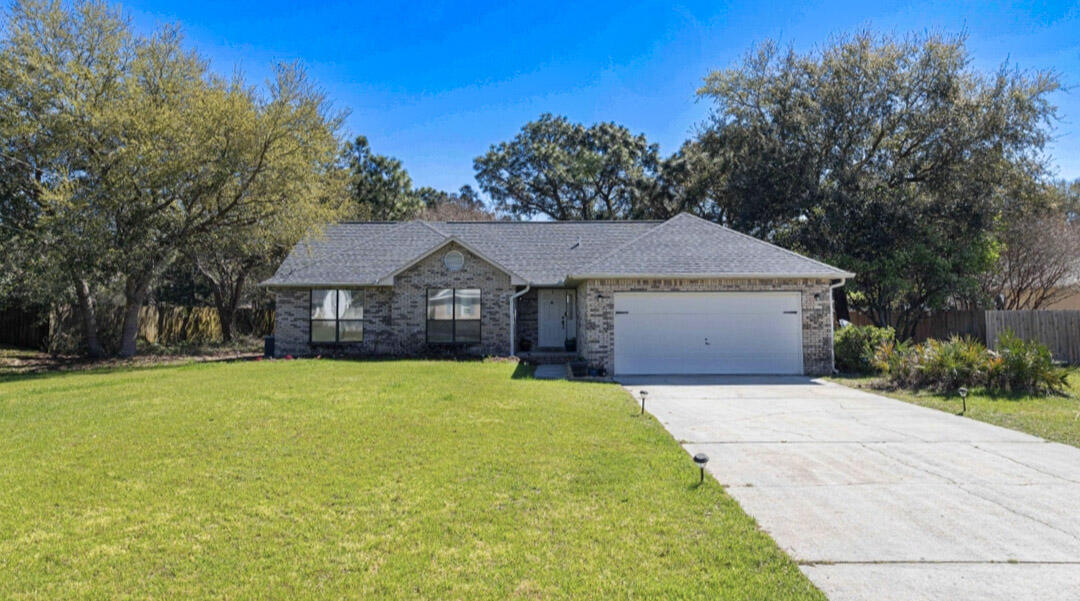 Charming 3-Bedroom Home in Navarre with Amazing Community Amenities! Welcome to 1920 Seahawk Lane- a beautifully maintained 3-bedroom, 2-bathroom home offering 1,491 sq. ft. of comfortable living space on nearly a half-acre of flat, usable land!Step inside to find modern granite countertops throughout, a spacious living area, and a screened-in patio, perfect for year-round relaxation. Major upgrades include a new roof (2021), HVAC system (2018), and garage door opener (2021)--offering peace of mind for years to come. The home also features an irrigation system on a well, keeping your lawn lush and green without the added water bill!Located in a desirable community, this home comes with exclusive Holley by the Sea amenities (playground, pool, fitness center, private beach, boa boat ramps and more) Ideal for those who love an active lifestyle or want to enjoy the best of Florida living! Plus, it comes with a transferable termite bond for added protection.
Conveniently located near top-rated schools, shopping, dining, and just a short drive to the stunning Gulf Coast beaches and Hurlburt Field!
All information is deemed to be accurate, buyers and buyer(s) agent to verify all measurements and pertinent details.
Don't miss out on this incredible opportunity schedule your showing today!