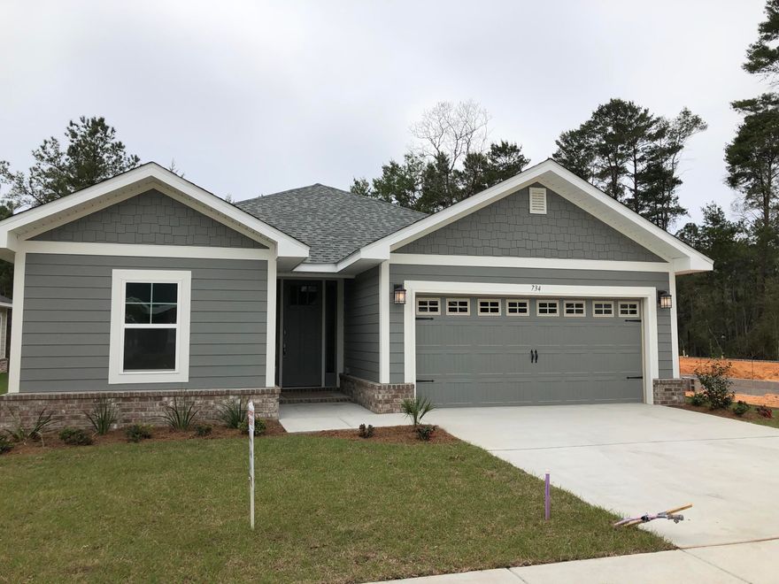 New Craftsman style home. Walking distance to Freeport Publix. 18 minutes to Grayton Beach State Park. Clubhouse and community pool now under construction. Low HOA fees of $91 monthly. 3BR/2BA with 2 car garage with door opener, 9' ceilings & 8' entry door, CoreTec Pro Plus luxury vinyl plank flooring, Moen faucets, lever-handled hardware. Fully sodded yard with sprinkler system.