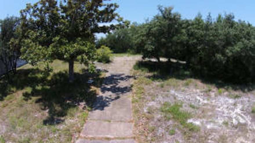 Come live at the Beach! Gulf Pines is a quiet subdivision located right on the Coast in SanDestin. Quick walk to the finest beaches in the world. Build your dream home with a tower to have an amazing view of water, lake and Destin. Close to all shopping, schools, hospital and Fine Dining. There are plans available that fit on this lot. This area is a must see. Lot is cleared and ready to build. Water and Sewer taps are paid and included in the price. Also electrical is run up to the middle of the lot for up to 400A service.