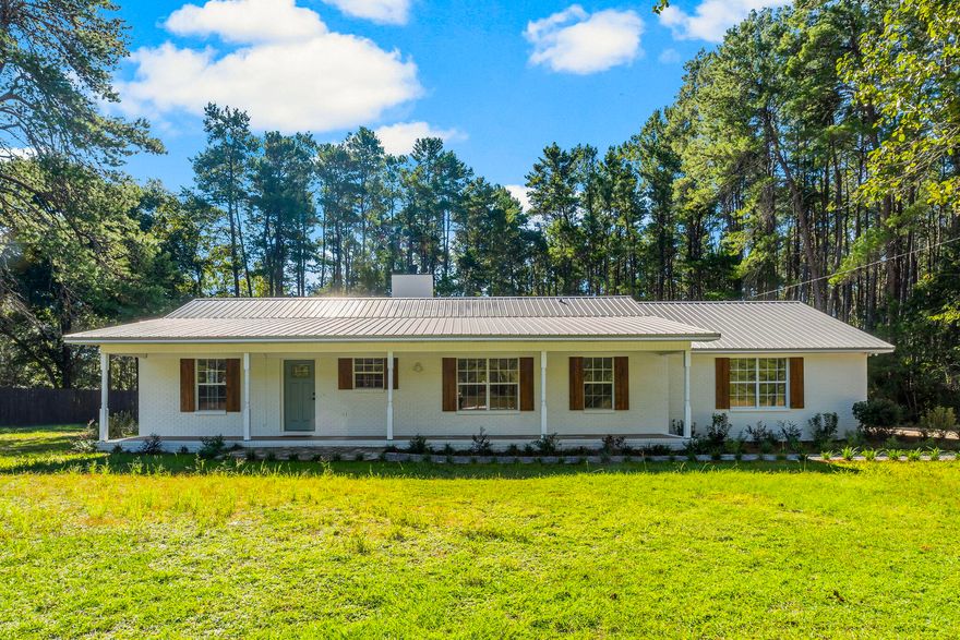 This fully remodeled ranch offers the perfect blend of modern living and rustic charm. Featuring luxury vinyl plank (LVP) flooring throughout, this home boasts three spacious bedrooms and three updated bathrooms. Enjoy cooking with all-new appliances in the fresh, contemporary kitchen. Kitchen opens up to cozy living room with wood-burning fireplace.
The property sits on a private, wooded lot with a partially fenced yard, ideal for outdoor gatherings.The yard is also a perfect area for additional parking for guests, extra vehicles, equipment, work trucks and vans, etc. Spacious front porch for sitting and catching sunset hues. No HOA restrictions, giving you the freedom to enjoy your home as you wish!
Located on HWY 3280 which is just 2 lights north of the 331 bridge. Easy drive to the beaches and happenings of South Walton and also the shopping centers and restaurants of Freeport.


The Beach Sunsets Inc. Resident Benefits Package is designed to provide convenience and professional services to our residents. By applying, Resident(s) agree to be auto-enrolled in the program and pay an additional $25.00 each month, payable with rent. Benefits of this package may vary due to the property specifications. No discount will be given if an element of the package is not available. The cost of this package is all-inclusive.