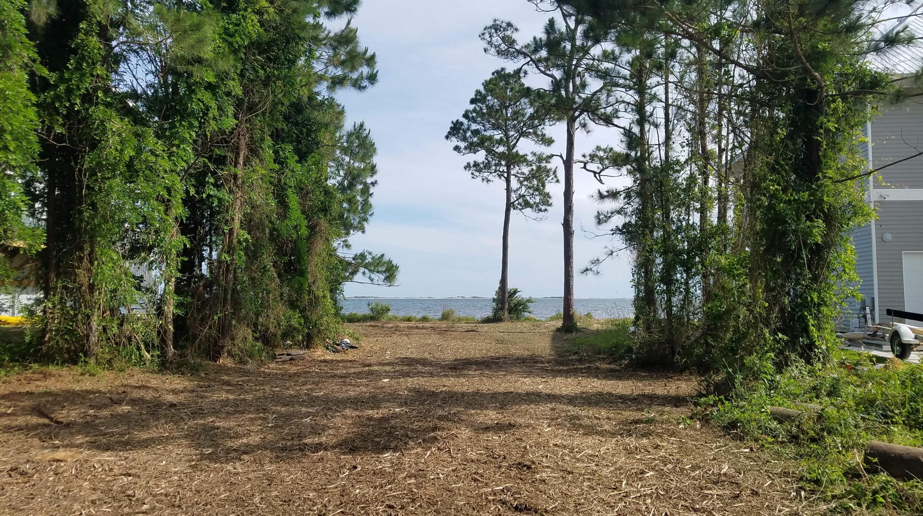 Beautiful Vacant, partially Cleared Waterfront Lot on Soundside Drive in Gulf Breeze!This lot is in a Prime location to build your dream, waterfront home on a quiet and beautiful waterfront street! Lot looks out over the Intracoastal Waterway and the Gulf Island National Seashore.Property next door (right side when looking from road) just built a gorgeous waterfront home on a similar size lot (per tax collector lot size info.)Condo building next door does not allow rentals less than 6months!Located within 2miles of the Gulf Breeze Zoo and a short drive to Navarre and Pensacola Beaches!Seller Financing available with 20% down!Contact your favorite agent to submit an offer today!