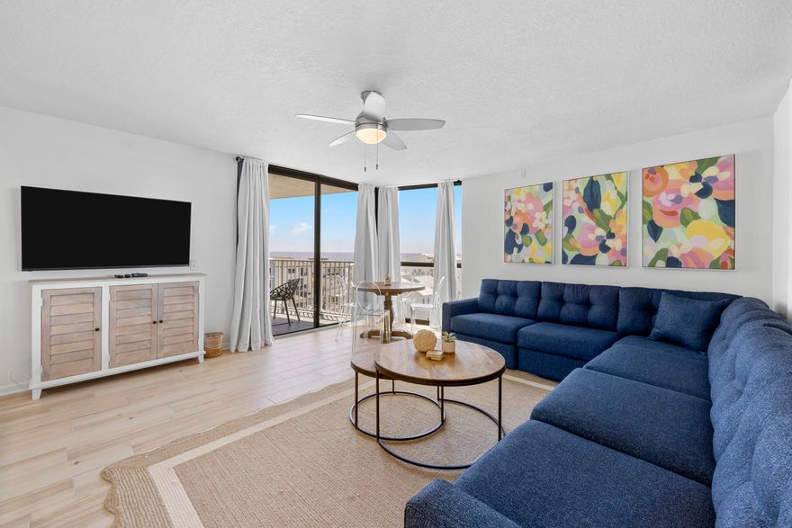 Are you looking for a fully furnished, rental-ready investment right on the beach? Do you want a property that has been recently updated with assessments already completed and paid for? Look no further . . . this 2 bedroom, 2 bath condo on the sixth floor is absolutely stunning, and it has the potential for $60,000+ yearly in rental income!The open concept and breathtaking coastline views create an inviting atmosphere that's perfect for enjoying both indoor and outdoor relaxation. The well-equipped kitchen with plenty of cabinet and countertop space is perfect for casual dining or entertaining guests. The breakfast bar provides extensive counter surface if you feel like cooking at home, and it doubles as an additional eating area with bar stools on the living room side. In the living room, the full-wall mirror makes the space look double in size, and it reflects the beauty of the Gulf. You'll also find ample seating and a wall-mounted TV. Why watch the TV, though, when you have a beautiful view and additional seating on the balcony? Enjoy your meals inside at the table near the floor-to-ceiling windows, or outside enjoying the landscape of crystal blue water and a white sand beach.
The large primary bedroom suite is a luxurious retreat, complete with balcony access, coastline views, a dressing area, and a private bathroom, offering a perfect blend of comfort and convenience. An additional bedroom with private access to the full hallway bath provides both flexibility and privacy for guests or family members.
When you purchase in Mainsail, you are buying an amazing waterfront property with incredible amenities. Not only do you have deeded access to a private beach, you can also enjoy the pool, hot tub, fitness room, tennis courts, shuffleboard, and community grills. In addition, locally owned restaurants like Surf Hut, Bistrology, Auston's and Lillie's Q Barbeque are less than a mile away, and the Silver Sands Premium Outlet stores are practically across Highway 98 from the Mainsail entrance! Everything you need and everything you could want are easily accessible from your beautiful new home away from home!
Gorgeous flooring, custom shiplap, accent wall features, updated fixtures - each unique detail adds to the luxury and comfort of this remarkable unit. Whether you are looking for a condo with fantastic rental potential or for your perfect personal get away, Mainsail #463 is here to provide.
