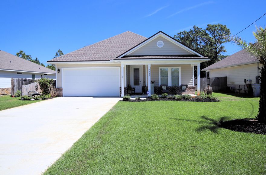 ABSOLUTELY GORGEOUS home centrally located in the heart of Navarre. Built in 2019 and meticulously maintained.  From the beautifully designed landscaping to the stunning in ground gunite salt water pool you will be amazed!  Live your best life with a screened pool and porch enclosure with privacy shades, custom pavered pool deck, solar heated pool, bluetooth outside speakers.   A landscaped retaining wall  was added around the pool area. A truly FANTASTIC outside OASIS! Wood look porcelain tile throughout; enormous kitchen pantry, oversized island, tiled backsplash, floating shelves, shiplap, granite countertops and MORE! Large laundry room with oversized wash basin. A must see for the discerning buyer!  Buyer to verify all measurements and pertinent information.