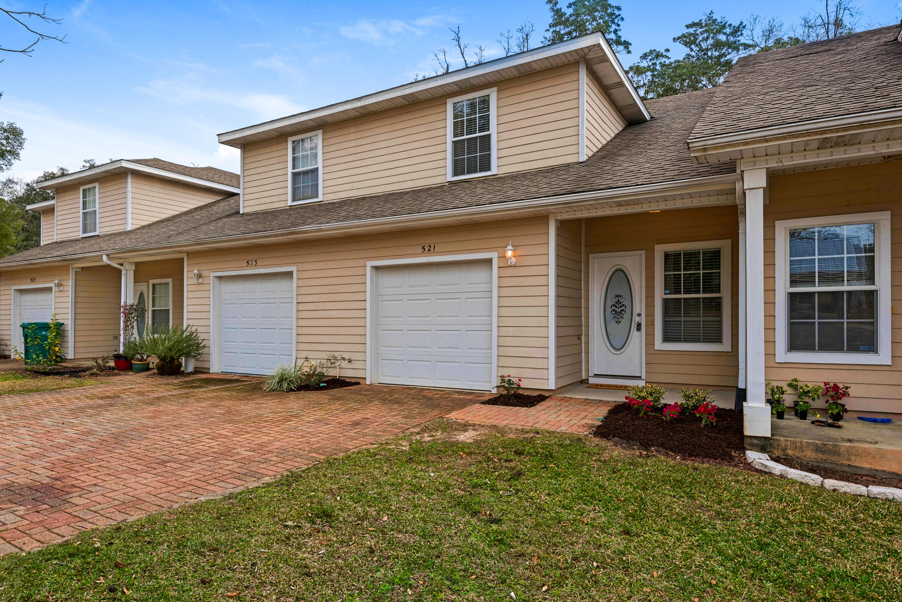 Fantastic townhouse within walking distance to the Bayou and easy commute to Eglin AFB. This 3 bedroom, 2.5 bath beauty features high ceilings throughout. The kitchen has plenty of cabinets with GRANITE counter tops and breakfast bar, as well as STAINLESS STEEL appliances. (Fridge with ice and water in the door included) Tile flooring throughout the first floor. Large living room flows into the dining area leading out the sliding glass door to the brick paver patio, perfect for grilling. All bedrooms are spacious and located on the second floor with ceiling fans. The master bedroom features two-closets with ensuite master bath with cultured marble combo shower and soaking tub. One-car garage with washer and dryer hook up. Come see the charm and value in this turn-key townhome perfectly