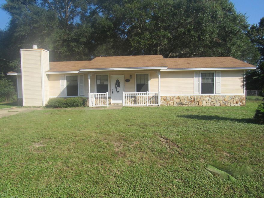 Look no further, this REO is for you! Great location just west of the heart of Crestview, this 3 bedroom 2 bath home has fenced back yard, covered patio and bonus room with fireplace! With indoor laundry, this home is just over 1300sf and great for first time home buyers or investors alike. Home has laminate floors, carpet in some of the bedrooms, tile in baths and tons a potential. Call today, or for sure this one will be gone!!