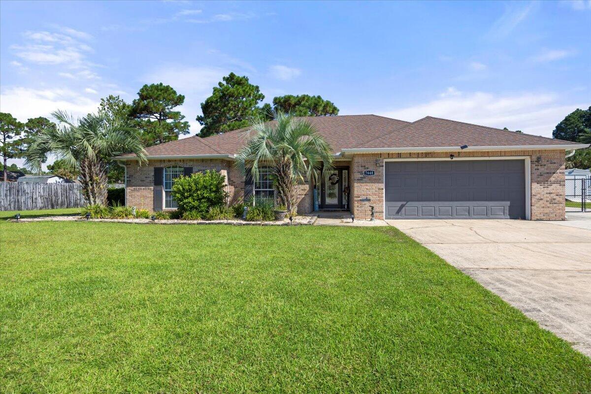 This beautiful home has been updated throughout with granite countertops, new cabinets, a HUGE sunroom (glass) with A/C, SS appliances, newer roof, newer water heater, AND solar panels that are PAID OFF!Additional parking for boat/RV/parties, etc., black chain link fence all the way around the nearly half-acre parcel with fruit trees, a shed in the backyard for additional storage, a MASSIVE walk-in closet, a full irrigation system, and so much more! This home is near the end of a cul-de-sac, so kids can play safely. Near military bases, restaurants, and the public BEACH! It will pass a 4-pt with flying colors. Never flooded. And don't forget about HBTS HUGE recreational facility!You MUST see this home- it's ridiculous.This property is priced TO SELL and won't last long