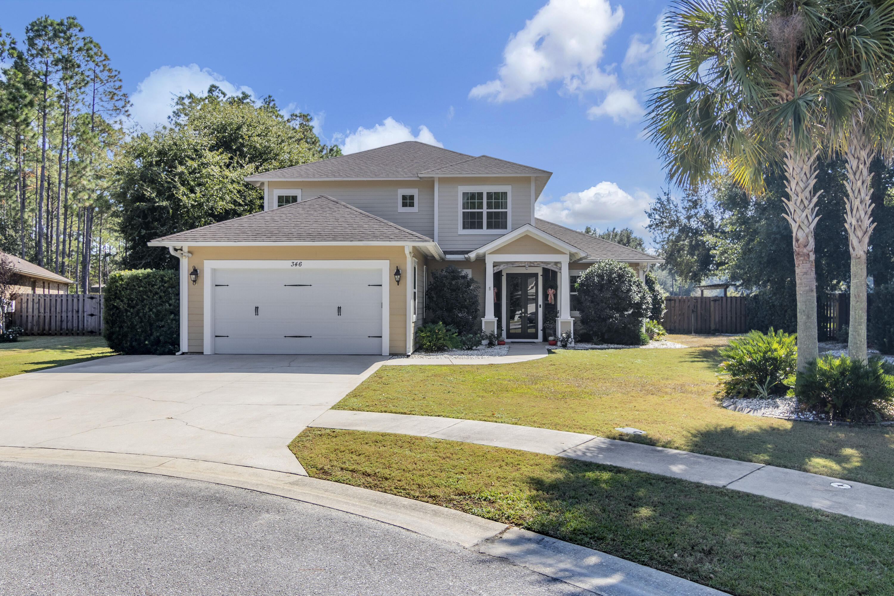 Welcome to 346 Concert Court, located in Hammock Bay. This beautiful custom-designed home showcases exquisite woodwork, a soaring cathedral ceiling with striking beams, and an impressive floor-to-ceiling brick fireplace that serves as the heart of the living space.Step into the tranquil lifestyle you've always dreamed of, complete with breathtaking lake views from your outdoor oasis. Unwind under the elegant gazebo, savoring the warm ambiance of the outdoor fireplace--ideal for both lively gatherings and peaceful evenings. This property also features a heated pool and spa, providing the perfect retreat for relaxation and rejuvenation. Nestled in a serene cul-de-sac, you'll find yourself just steps away from a private nature trail, making it an idyllic haven for outdoor enthusiasts. Experience modern living at its finest with a whole-house sound system to fill your home with your favorite tunes. The meticulous craftsmanship is evident throughout, featuring 2 by 6 construction, a convenient laundry chute, soft-close cabinets, and energy-efficient spray foam insulation. Don't overlook the built-in attic shelving for all your storage needs.

The kitchen is a true highlight, boasting stunning brushed granite countertops and a wine refrigerator that will impress any entertainer.

This is more than just a house; it's a lifestyle waiting for you. Schedule your appointment today and discover the paradise you've been searching for!