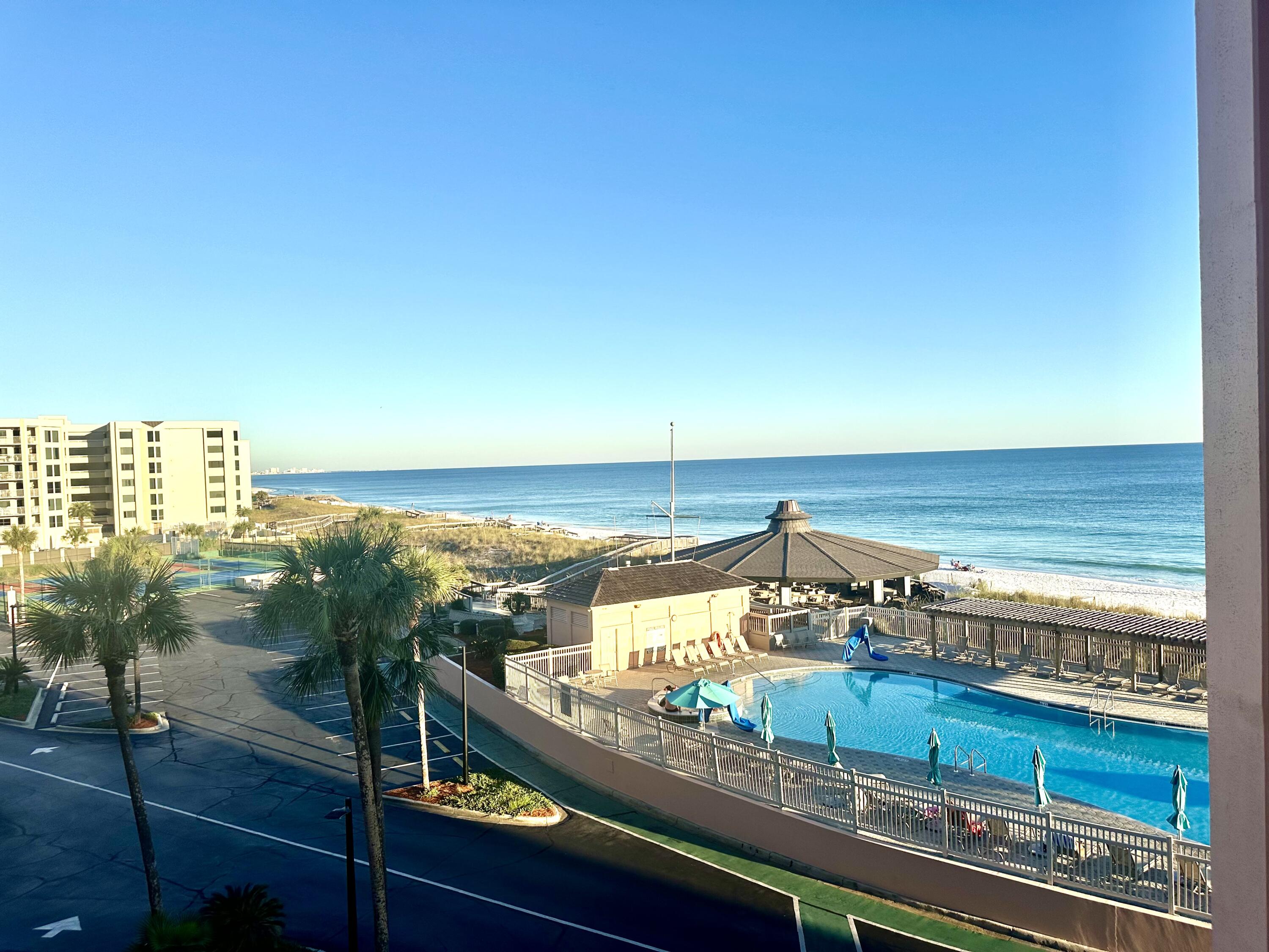 Jetty East is a Gated 7-story midrise located on the beautiful sugar sand beach in Destin, Fl. The location is unique as it is located on Holiday Isle (Gulf Shore Drive) which ends at Destin Harbor.  It's great for biking or walking. The jetties of the east pass make a great spot to snorkel or fish from the jetties.   Jetty East is one of the few condos to offer covered parking.  The required Milestone Study and Structural Reserve Study were completed mid-summer. There was an assessment August 1, 2024, for replacing the building sky light.   The assessment has been paid in full. Unit 313B is a 2 bedroom, 2 bath condo overlooking the pool and offering views of the Gulf.  Gulfside 2 bedrooms aren't listed often so now is your chance. 313B has been a residence for the last 14 years.  Rental numbers from similar units are $50,000 to $56,000. Remodeled units like 313B tend to have a higher gross income. This unit underwent a major renovation in 2020 to include gutting and remodeling bathrooms with new cabinets, granite, enlarging master closet, new cabinets new appliances, paint, Solid door, plantation shutters and room darkening drapes.  The upgrades and exclusions list are under the document section for your review.  The unit features EFCO (category4) sliding glass doors and windows paid for by the seller.  Approximately a $25,000 value.  Begin and end each day enjoying spectacular morning views of the Gulf of Mexico. Enjoy evening sunsets and seasonal fireworks from the beach. Great location for shopping, grocery stores(New Publix) and restaurants. Jetty East Amenities: 900 feet of beach, 2400 sq. ft. pool with sun deck, hot tub, beach side pavilion with charcoal grills, tennis courts, pickleball, fitness room, kids' activities, music entertainment, shuffleboard, covered parking, 24-hour security. Nice owners room with full kitchen for meetings or parties.  Financing Note: Jetty is a Non-warrantable/ Condotel.   No conventional (government backed Fannie or Freddie) financing.   Upgrades and Exclusions under Documents 